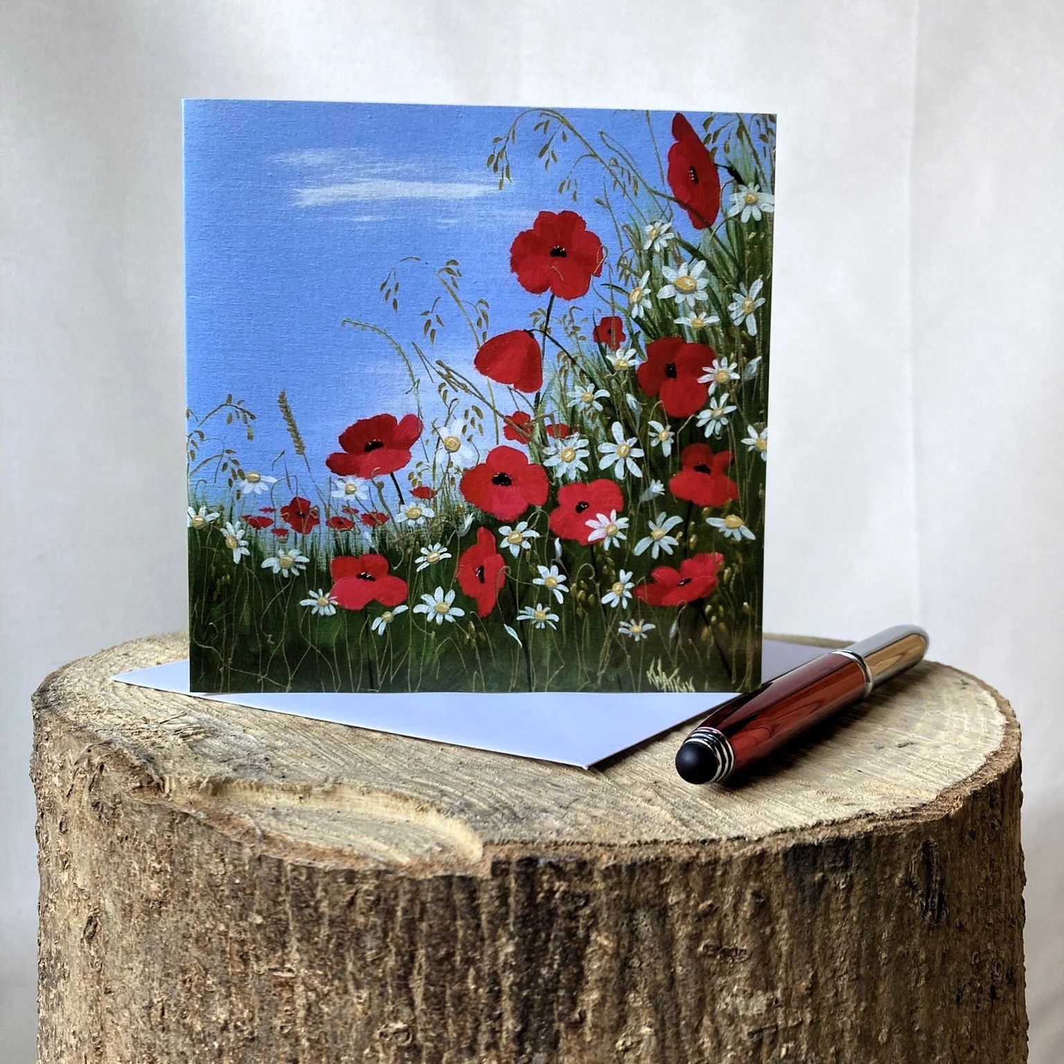 greetings card showing floral meadow with red poppies and daisies IMG_5787.JPEG