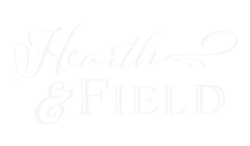 The text 'Hearth & Field' written in white cursive and block letters on a black background.