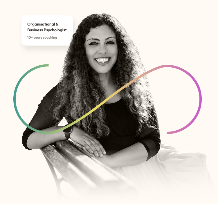Dina Ramadan is sitting with her arms crossed on a chair, with a graph line overlay and a text box indicating her as an organisational and business psychologist with over 10 years of coaching experience.