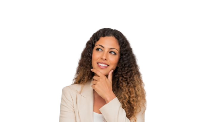 Thoughtful woman with curly hair wearing a beige blazer, thinking with her hand on her chin.