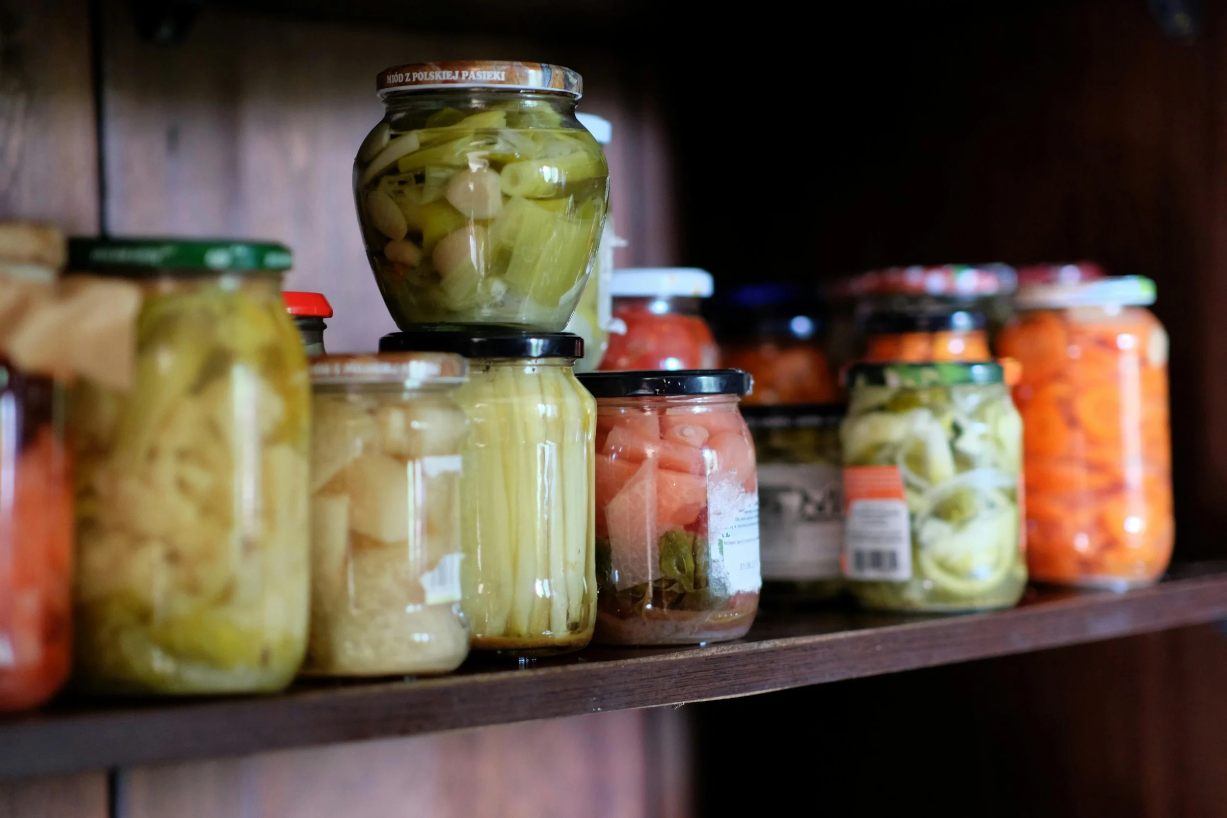 root cellar filled with canned vegetables and preserved food for off-grid living
