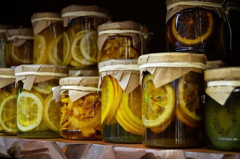Glass jars of home-canned food showing a common method of preserving fruits and vegetables