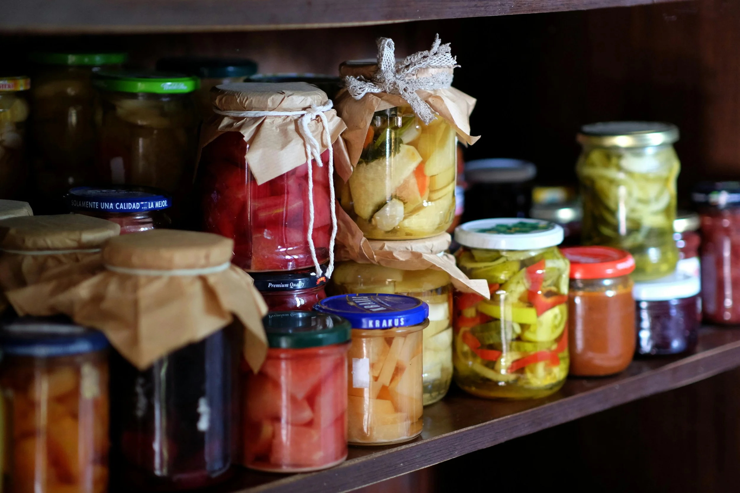 Examples of food preservation methods including canned vegetables, dehydrated fruits, and frozen foods