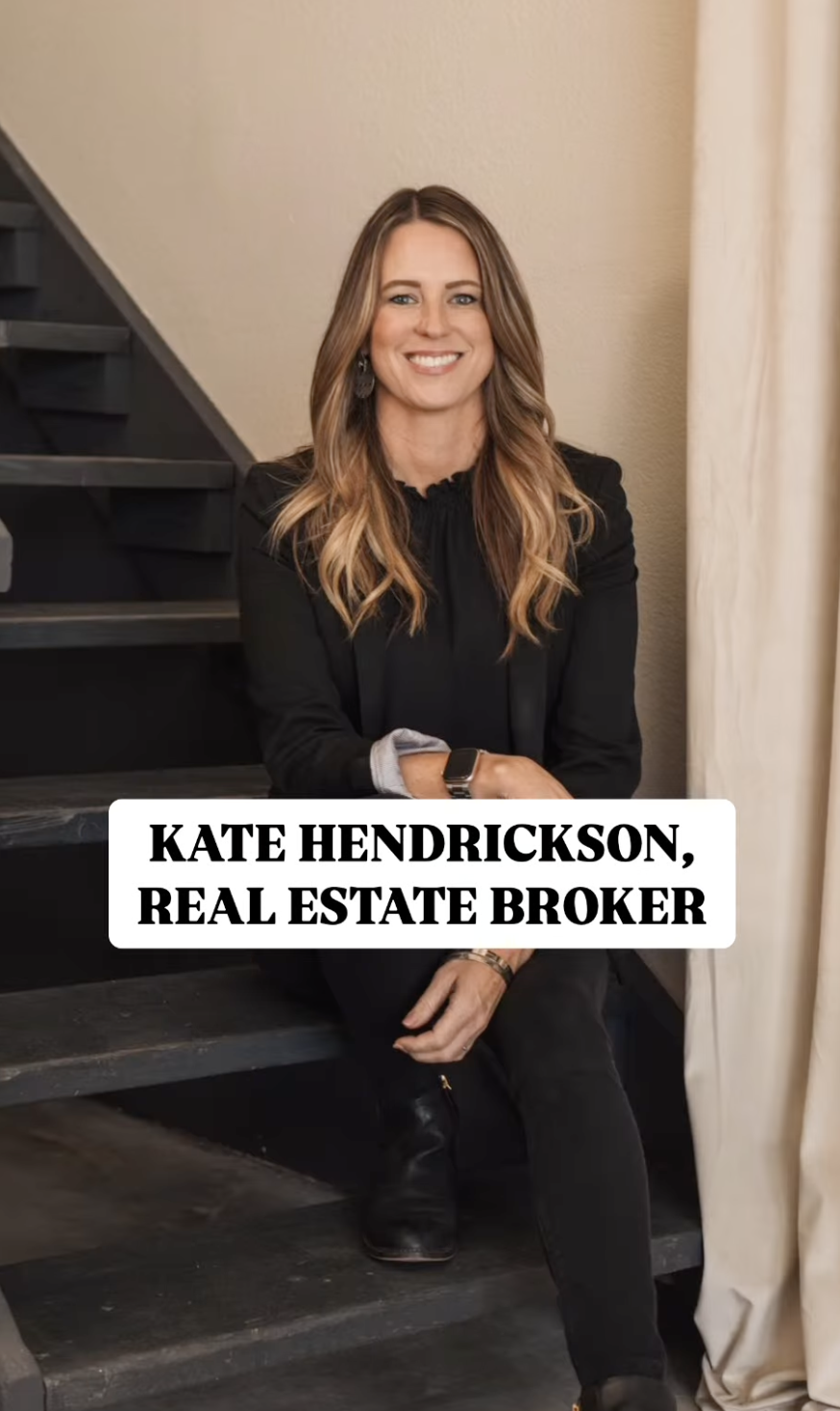 Kate Hendrickson, San Luis Obispo real estate broker, seated and smiling indoors.