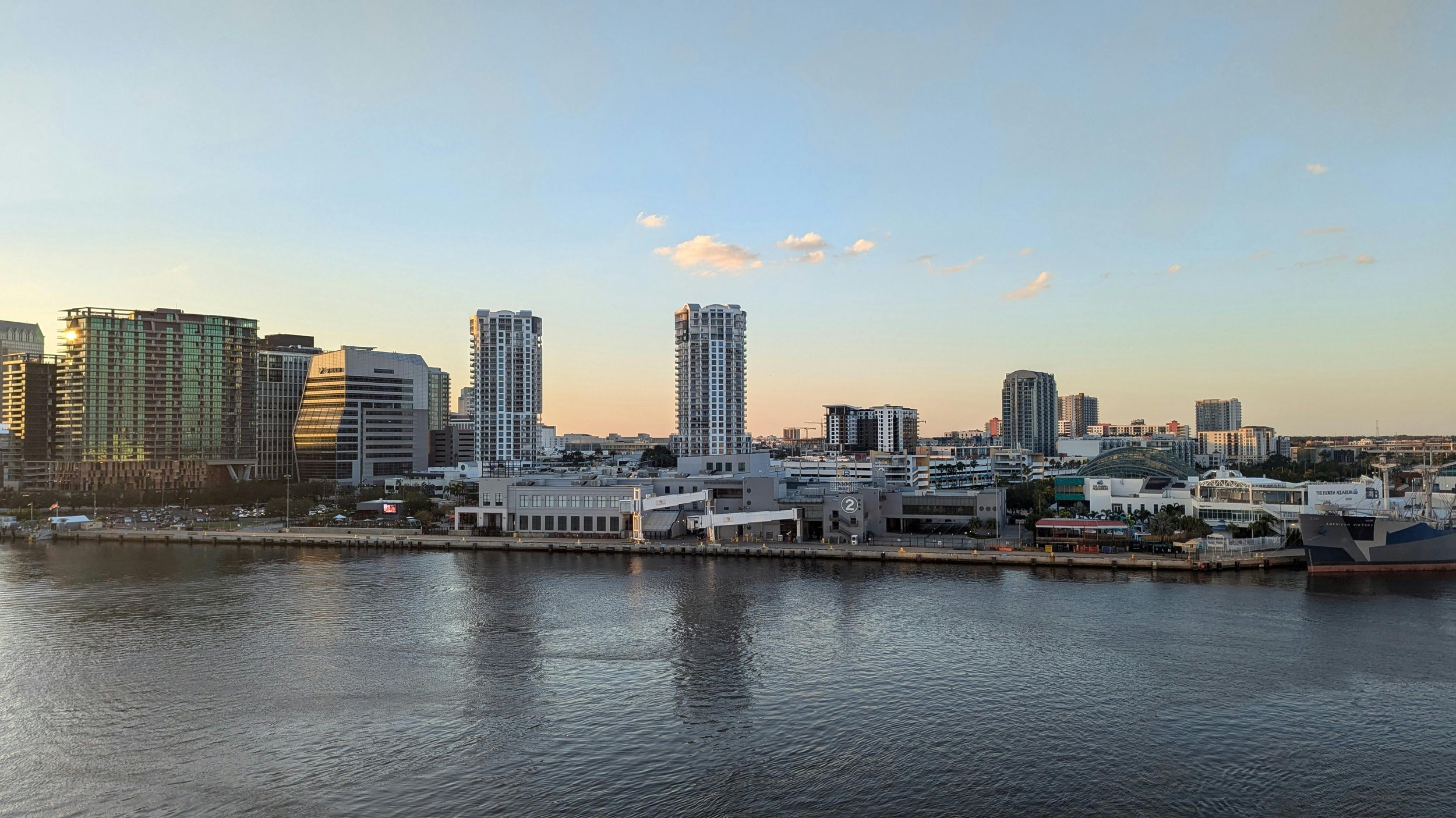 Scenic waterfront view of Tampa Bay skyline at sunset, popular spot for those exploring how to meet singles in Tampa
