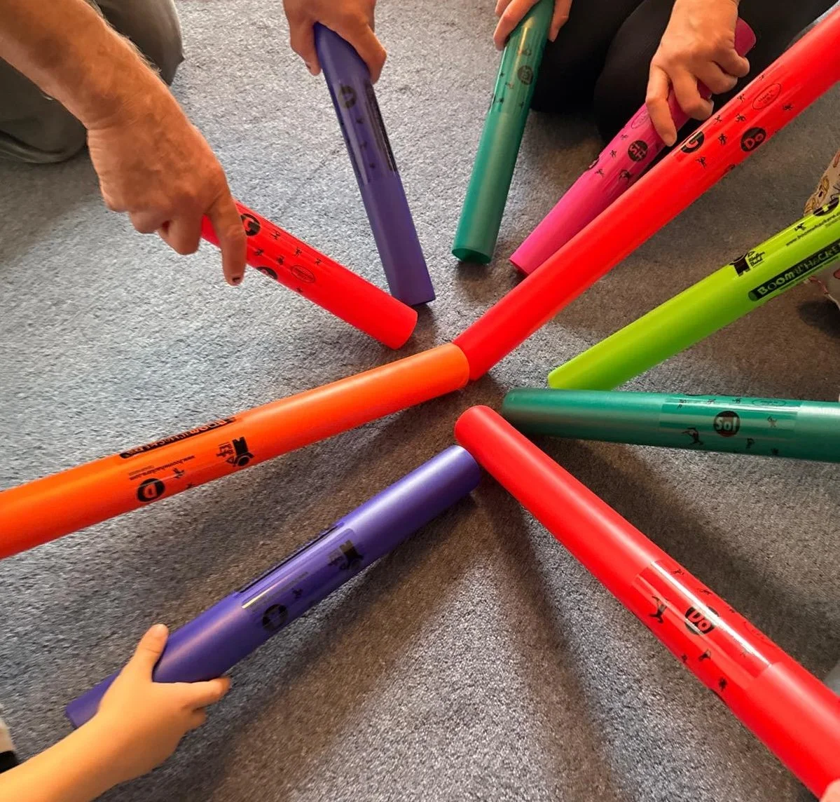Hands playing Boomwhackers®