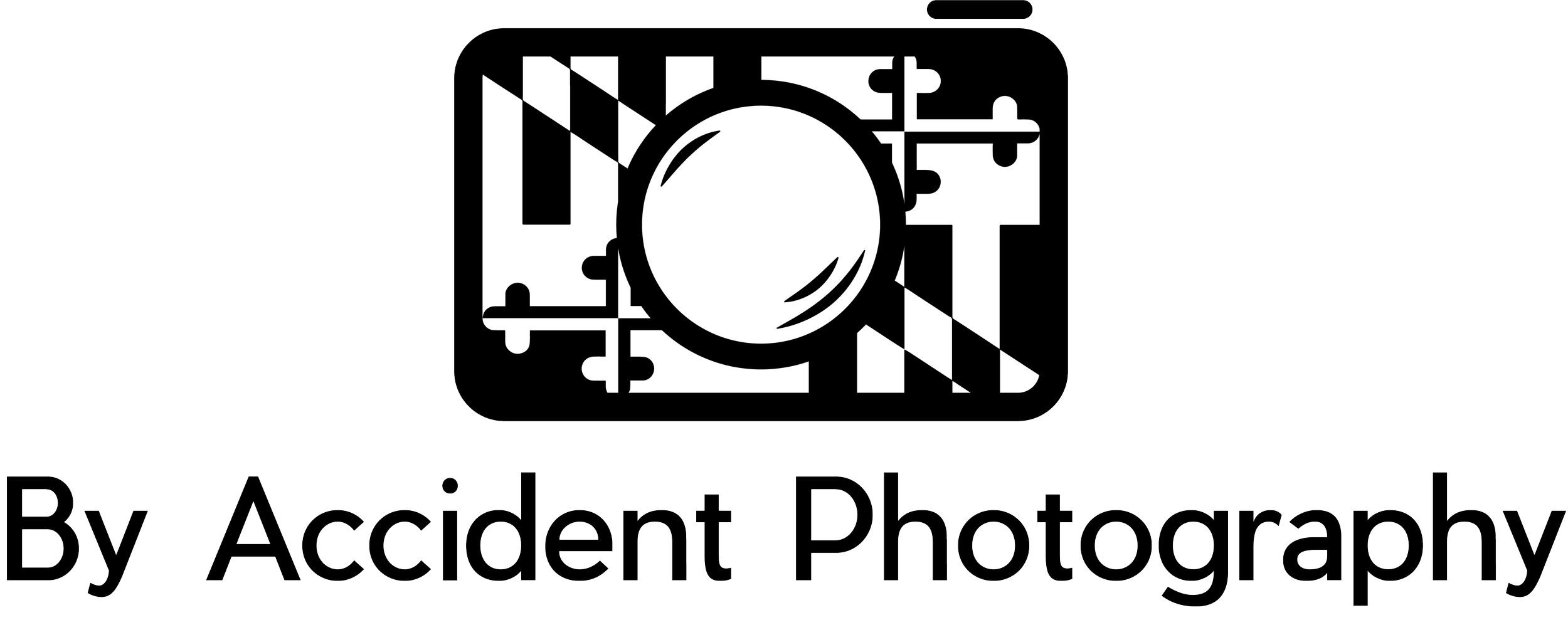 A logo with a camera icon and the text "By Accident Photography" underneath.