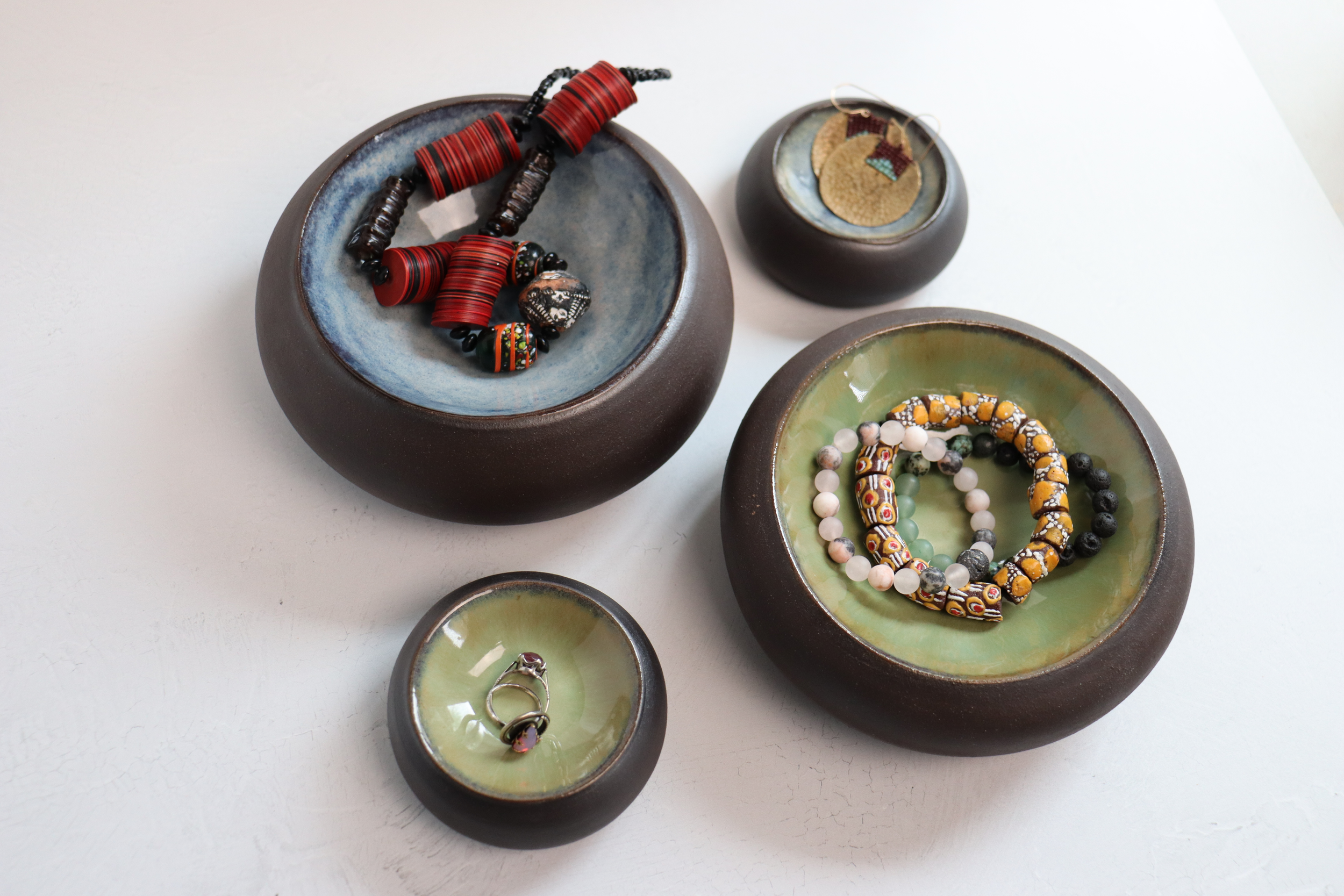 Medium and small dark stoneware bubble dishes