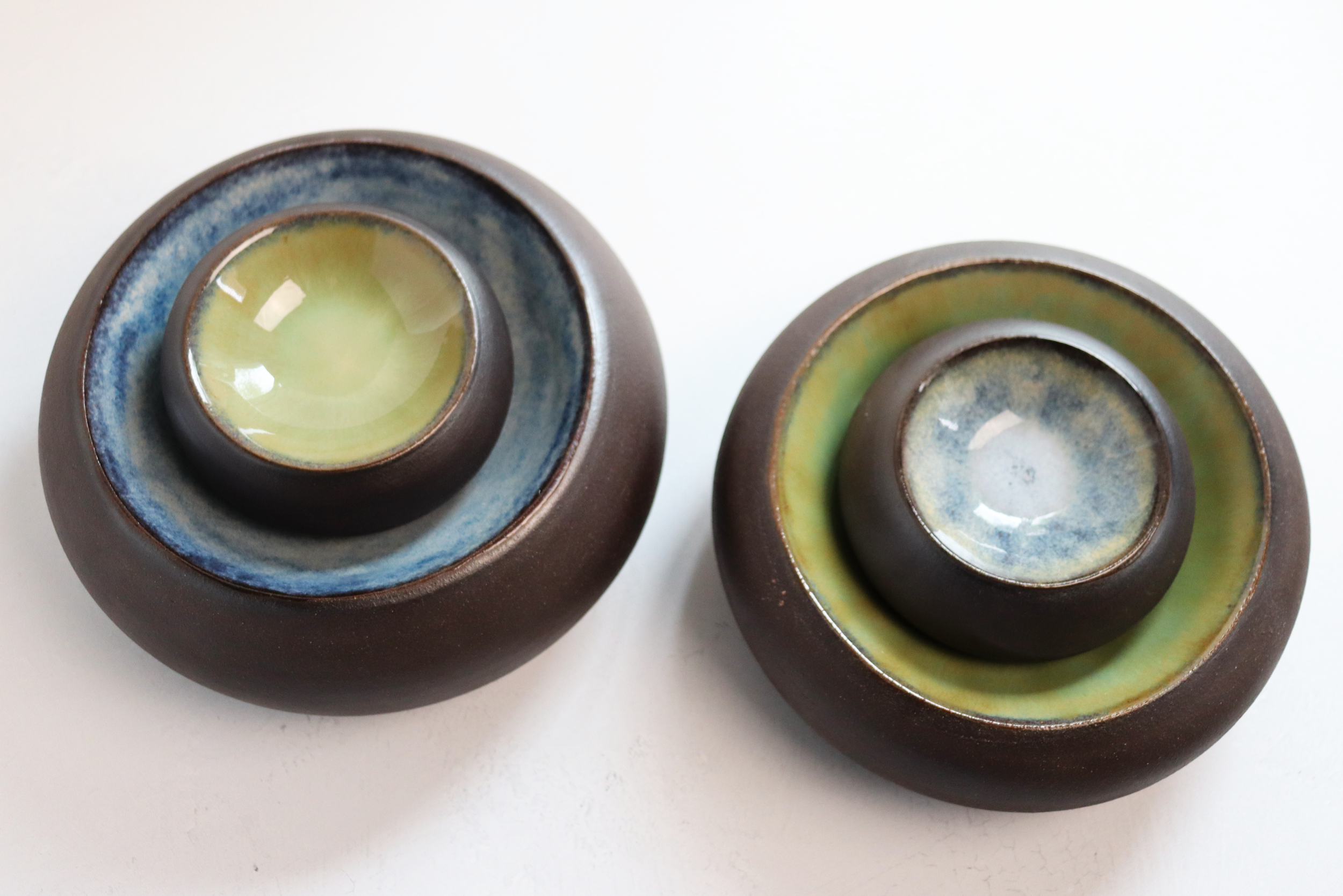 Medium and small dark stoneware bubble dishes