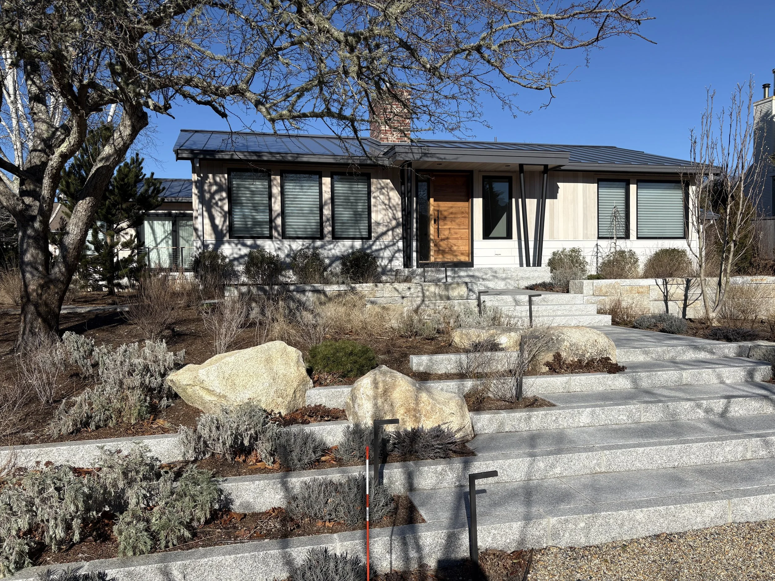 Simple ranch to mid-century inspired luxury cape house 