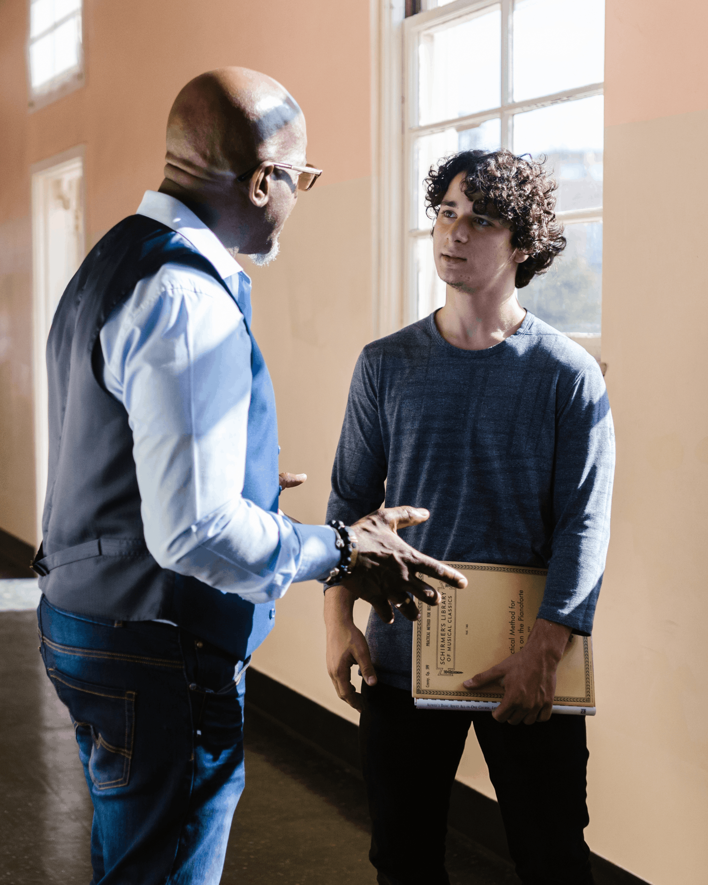 Mentorship and advocacy support helping a young athlete navigate challenges with a trusted adult.