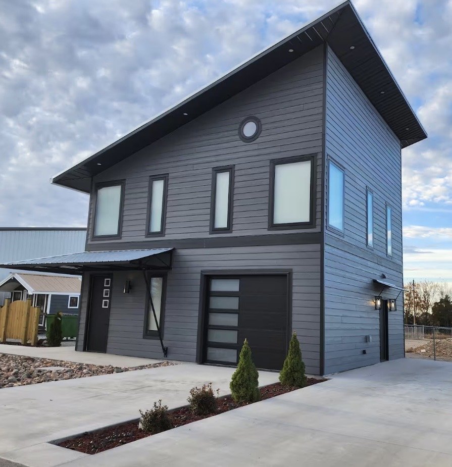 Highway Hideaway is a stylish and inviting second-floor stay featuring modern décor, comfortable sleeping spaces, a full kitchen, and everything guests need for a relaxing getaway.