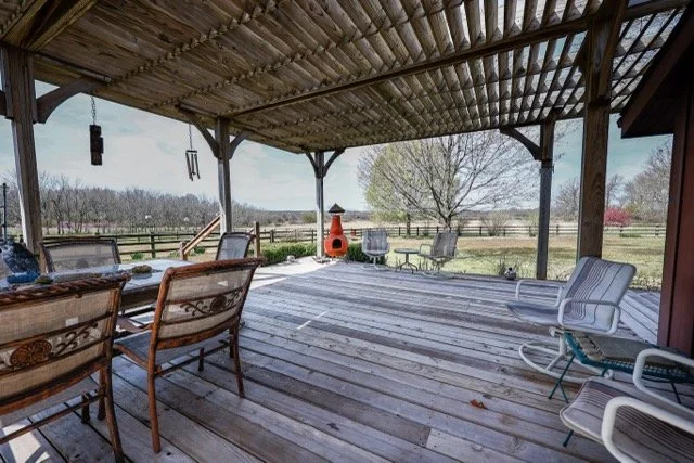 Covered porch at the White Squirrel Lodge 