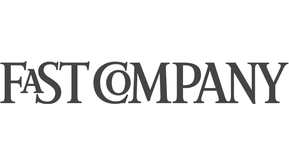 A logo for a brand called 'The Fast Company' with stylized, overlapping black letters on a white background.