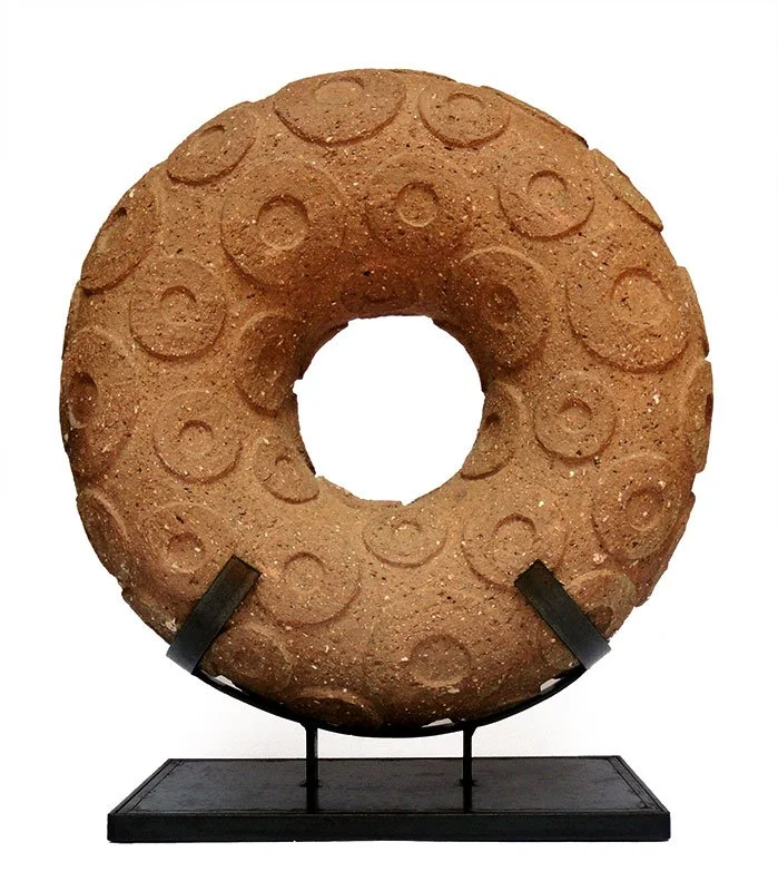 A large, solar sun sculpture.