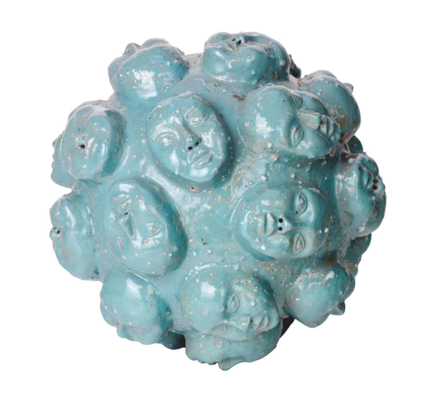 Blue ceramic sculpture composed of multiple human-like faces grouped together.
