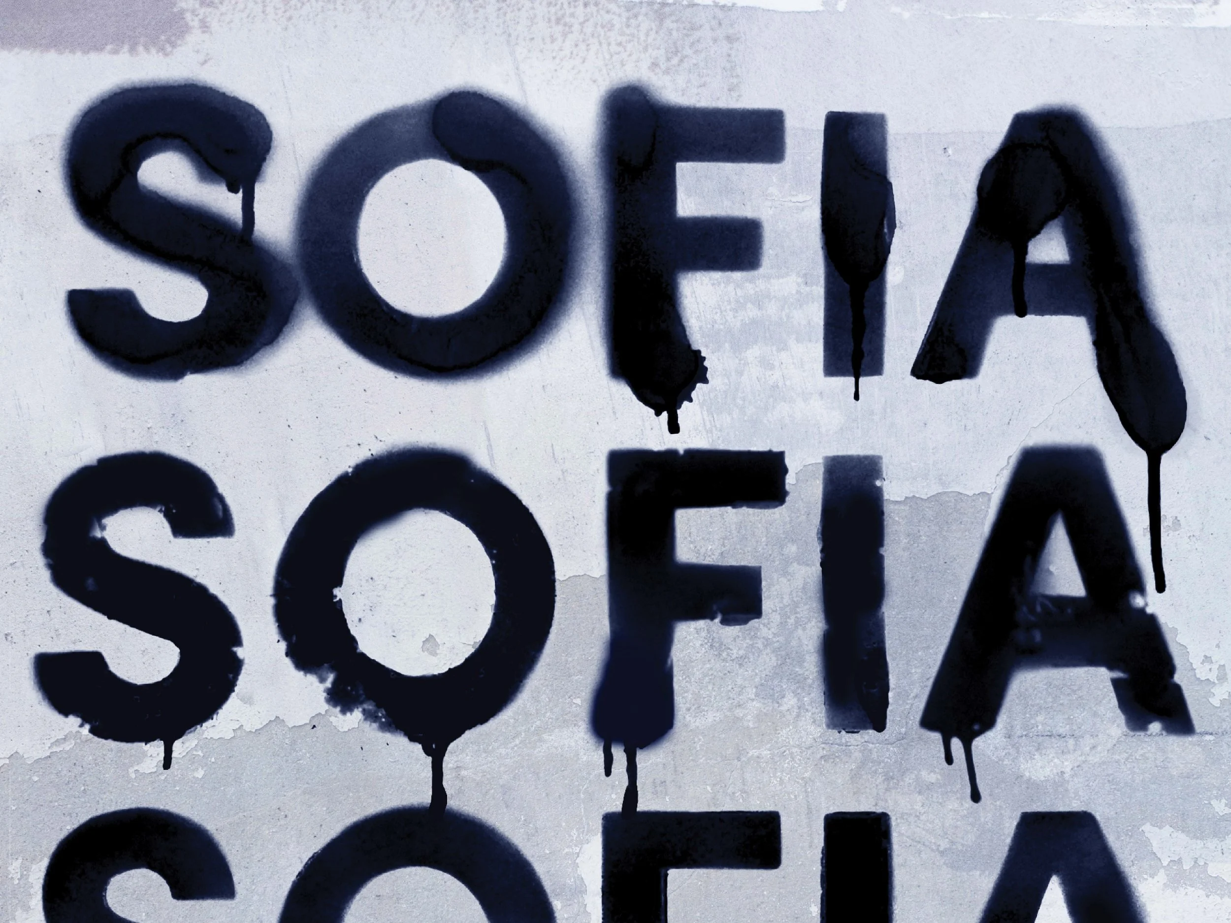 A peek at the process, including my fingerprints and some spray painted stencils.