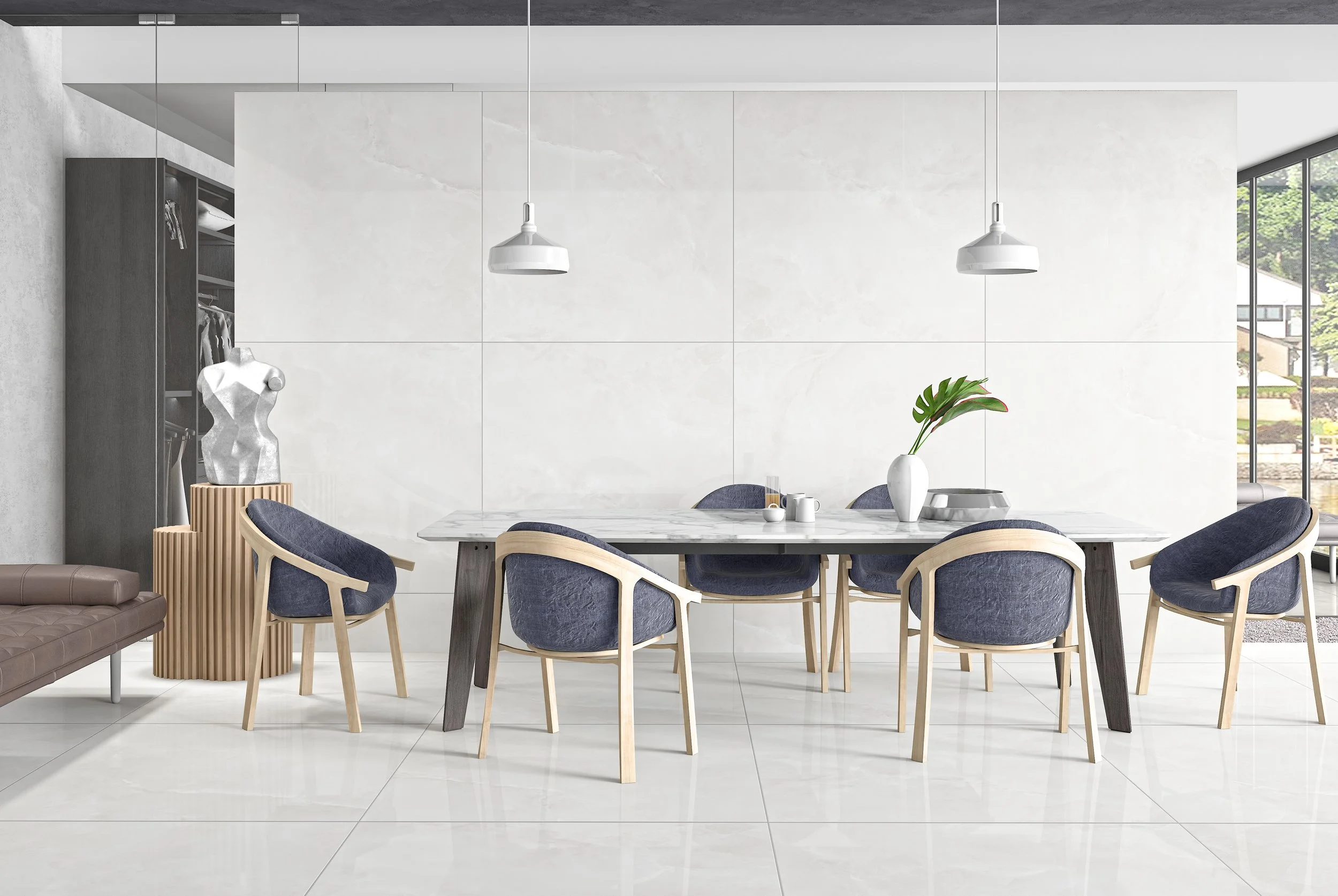 Modern dining room with a white marble table, eight navy blue upholstered chairs with wooden frames, a white vase with a green plant, and two white hanging pendant lights.