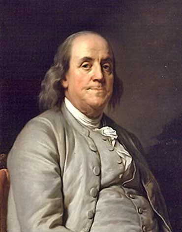 Portrait of Benjamin Franklin with gray hair, wearing a gray coat and white cravat.