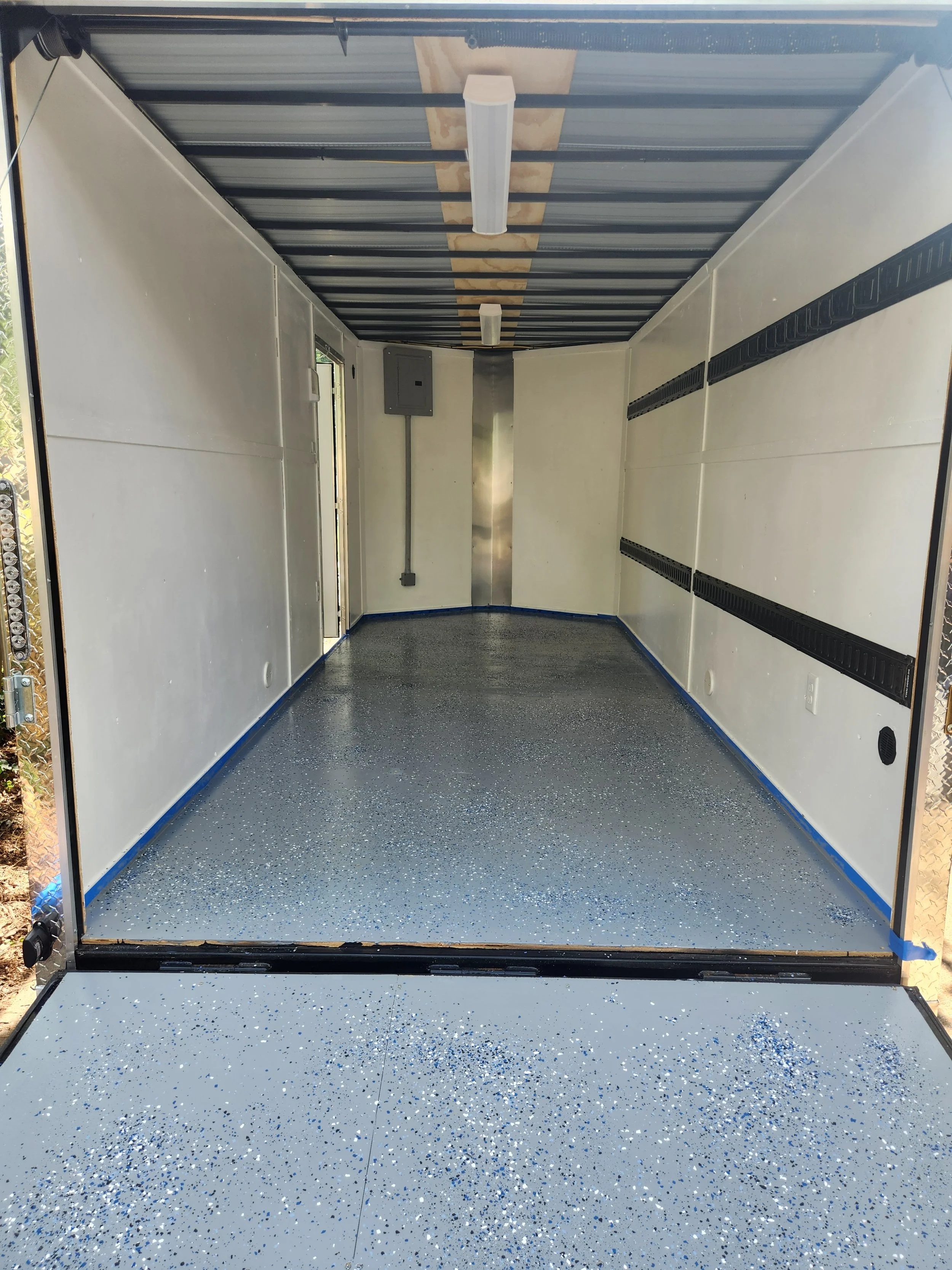 Day 3 -  Two coats of Epoxy on the floors.