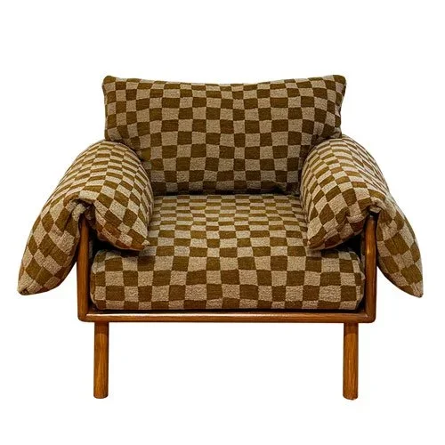 A vintage armchair with brown and beige checkered fabric and wooden legs.