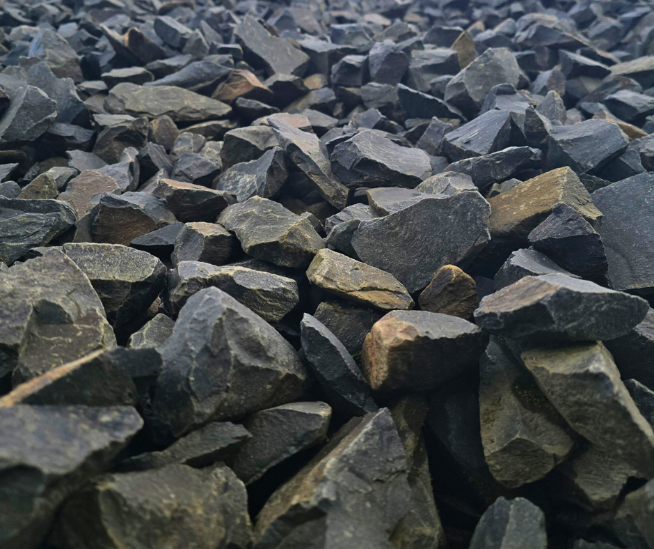Close-up of loose black and gray rocks or gravel.