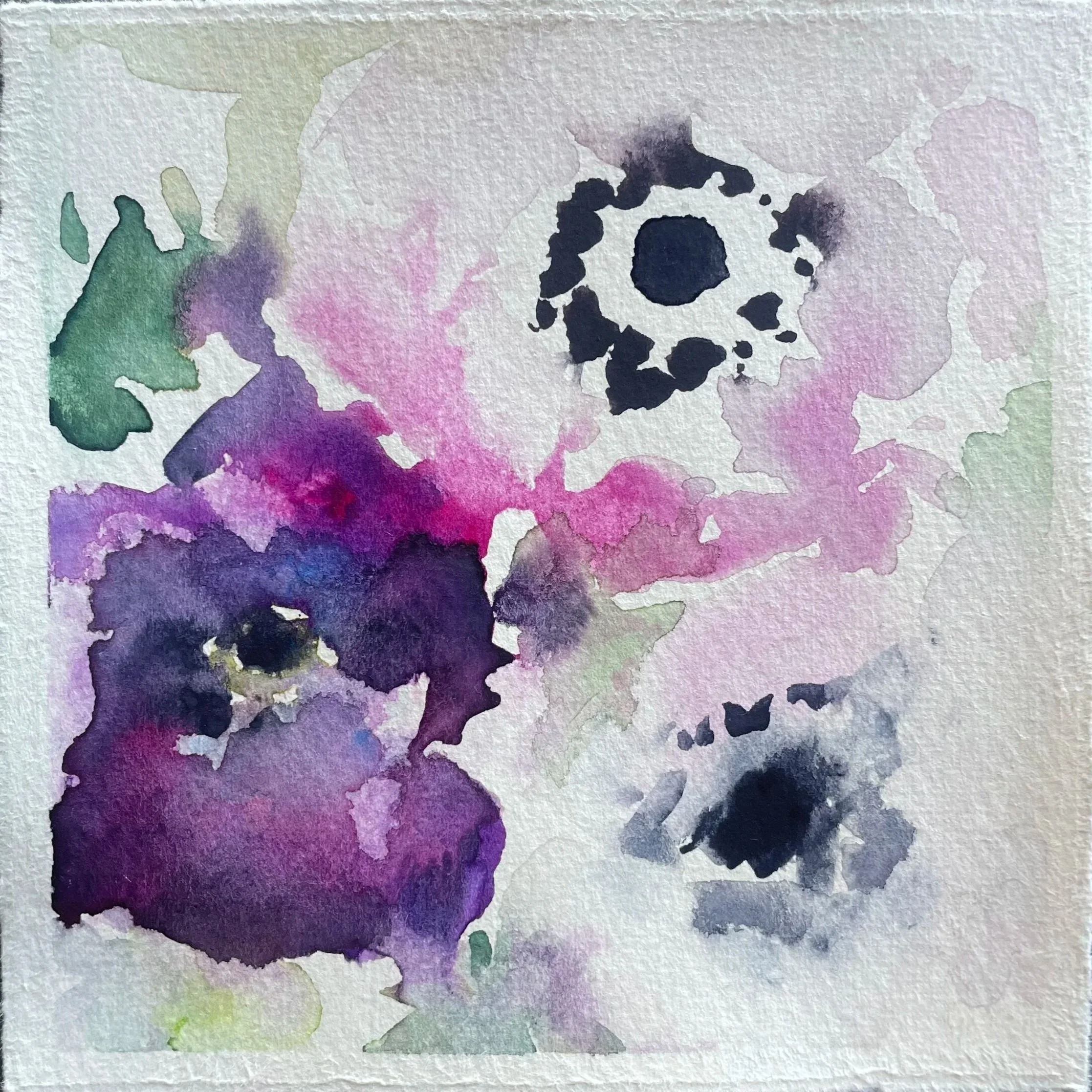 Watercolor painting of purple, pink, and black abstract flowers on textured paper.