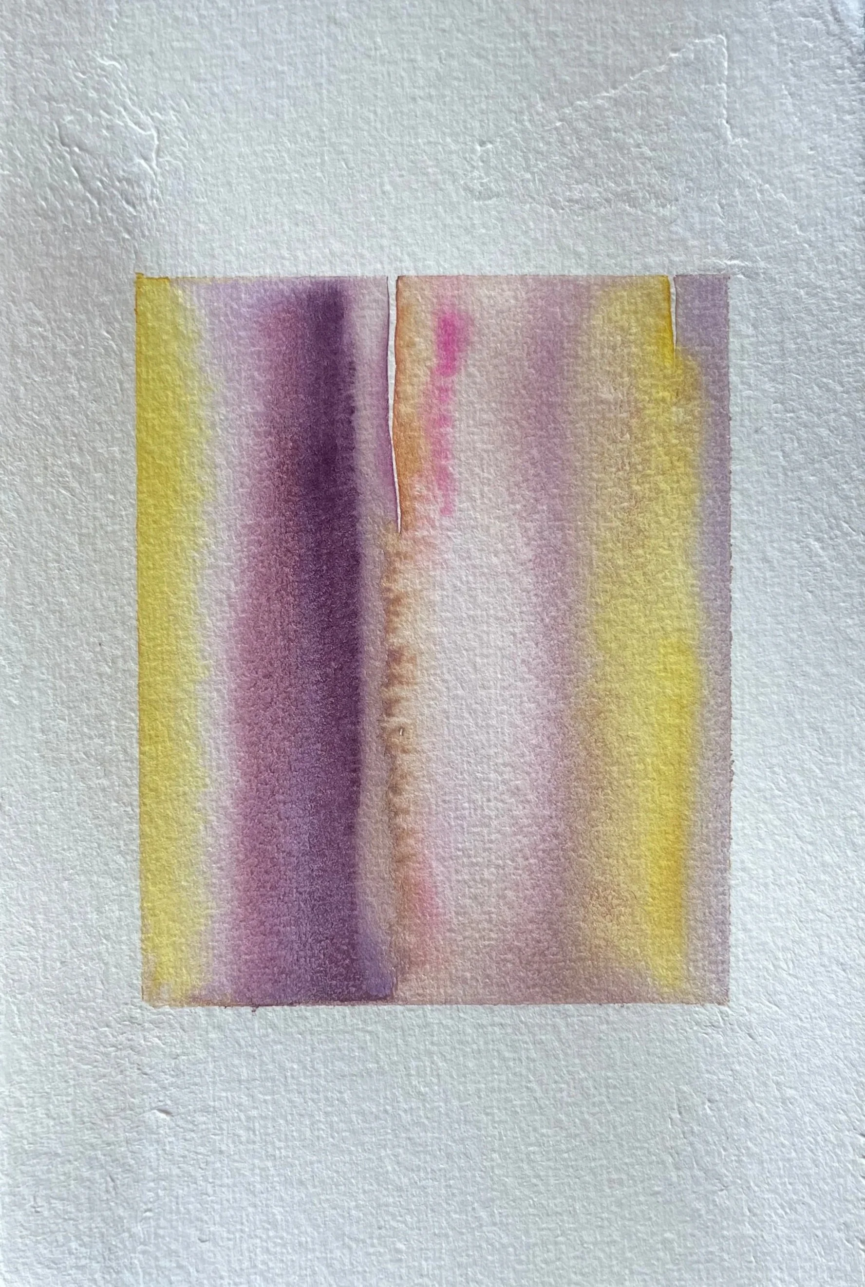 Abstract watercolor painting with vertical color bands in purple, pink, yellow, and beige on textured paper.