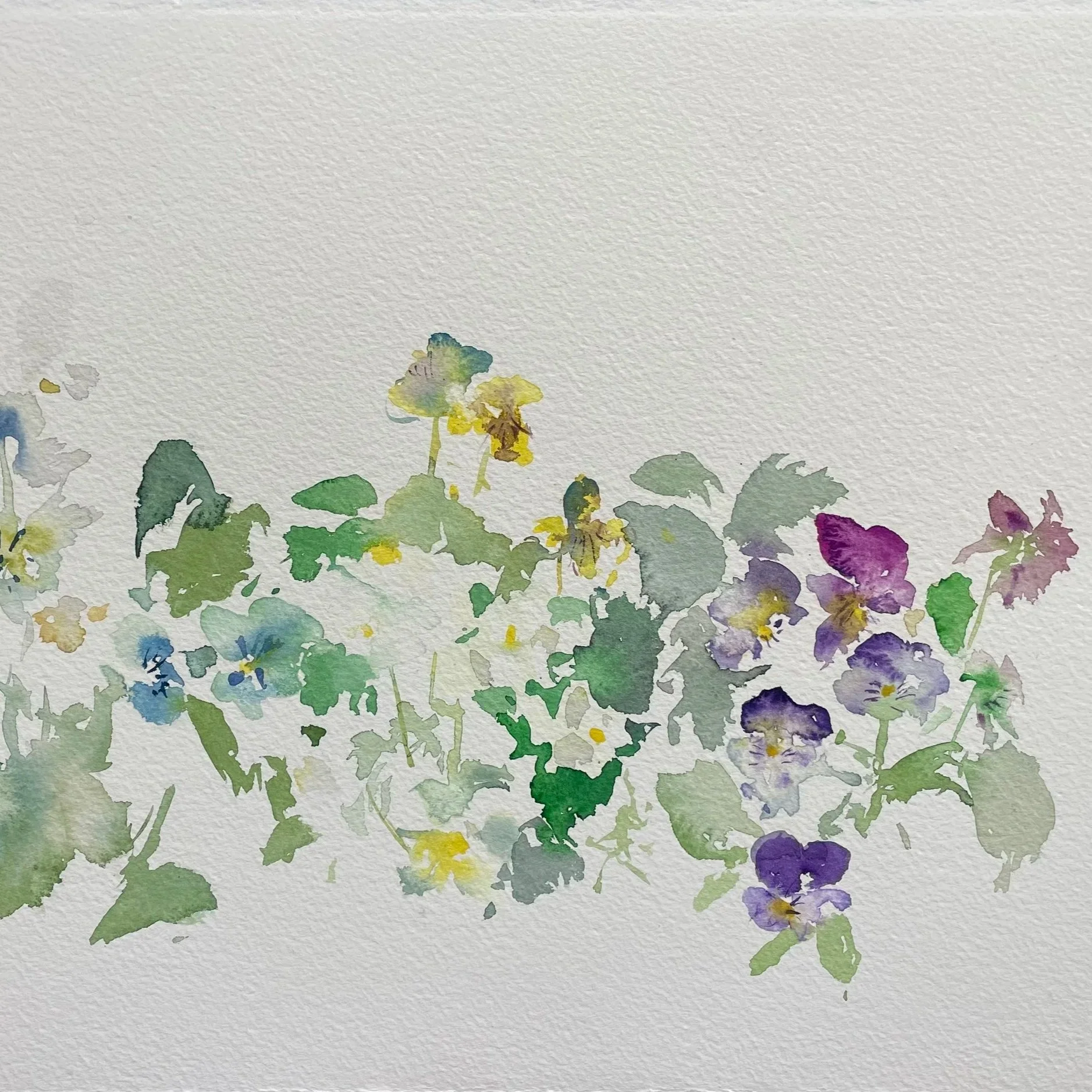 A watercolor painting of a cluster of small, colorful flowers with green leaves on a white textured background.