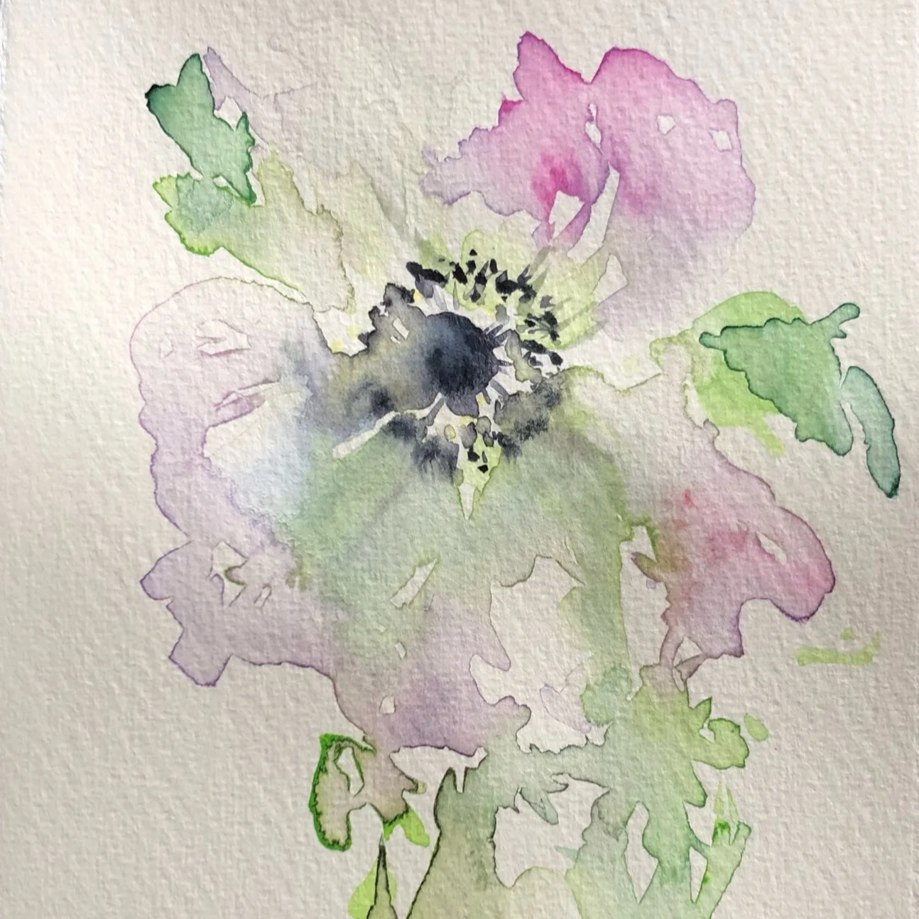 Watercolor painting of a flower with pink, purple, green, and black accents on textured paper.