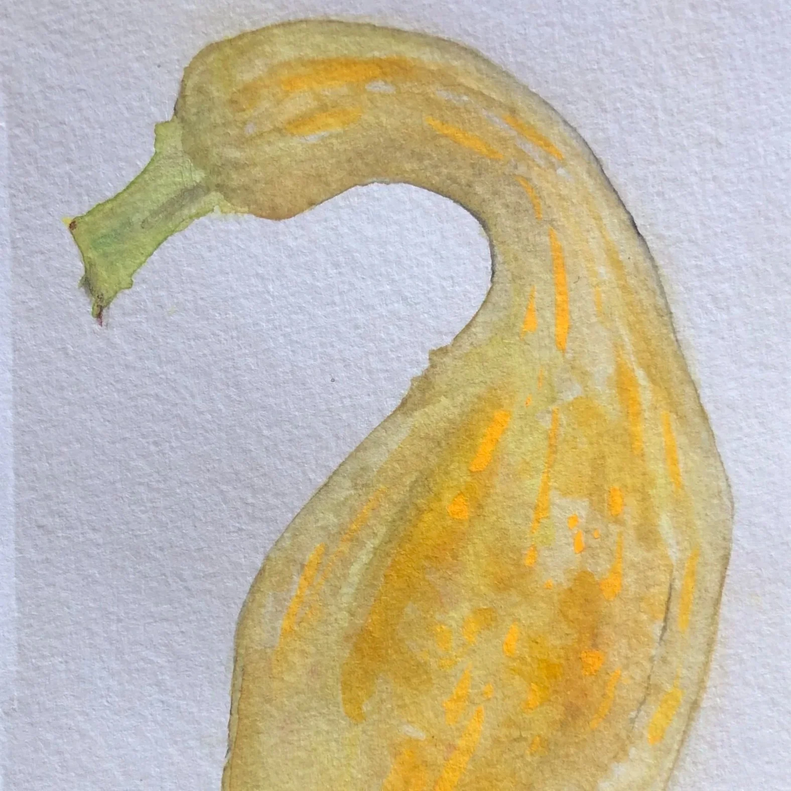 A watercolor painting of a yellow banana with green stem on textured paper.