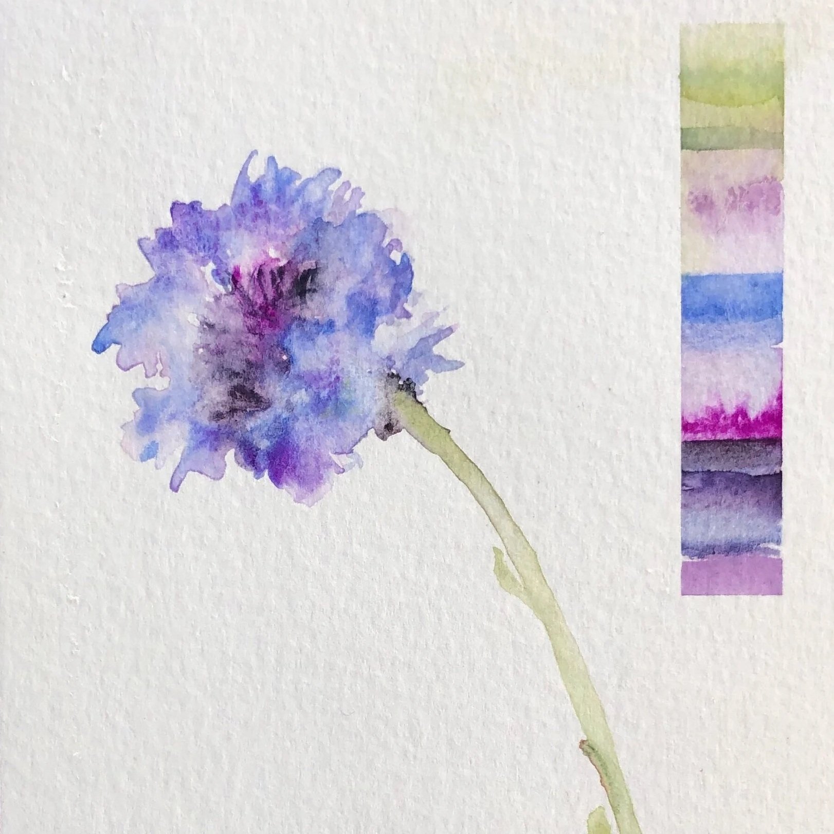 Watercolor painting of a purple flower with a green stem on textured paper, accompanied by a color palette strip showing shades of green, purple, and blue.
