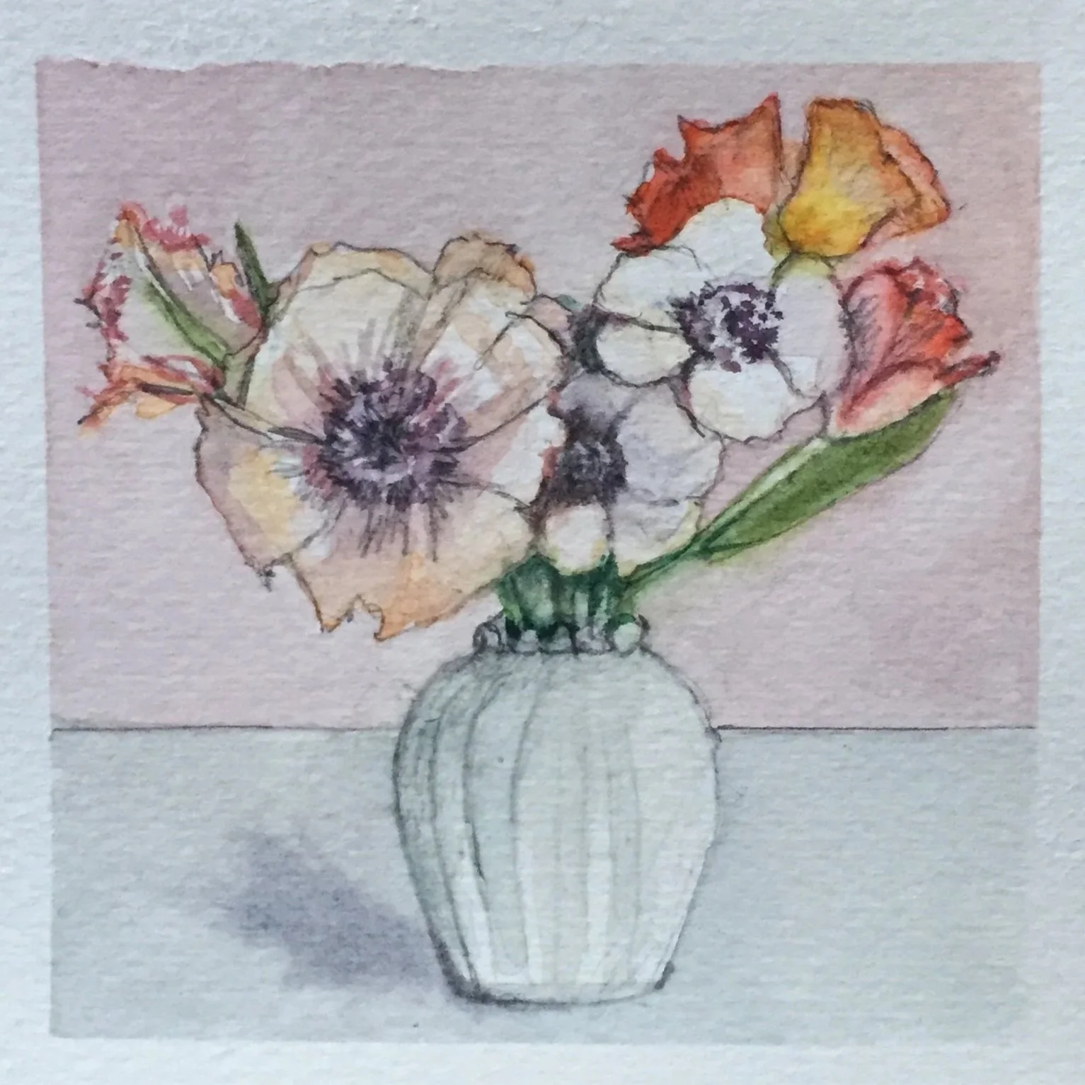 Watercolor painting of a bouquet of assorted flowers in a white vase.