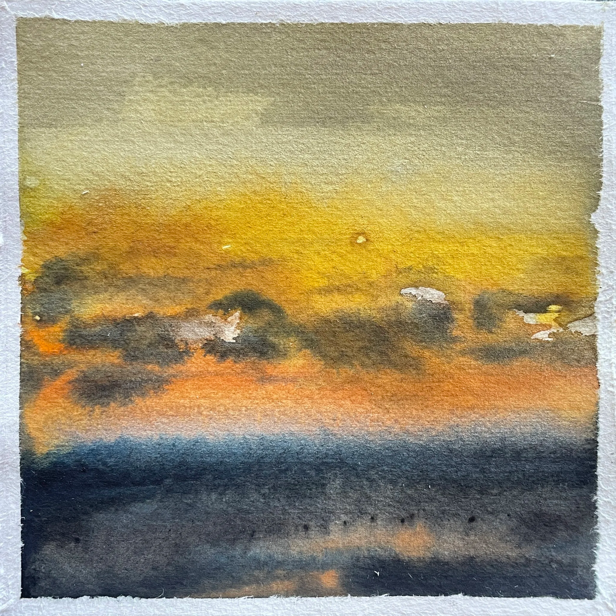 Watercolor painting of a sunset with clouds and a distant horizon.