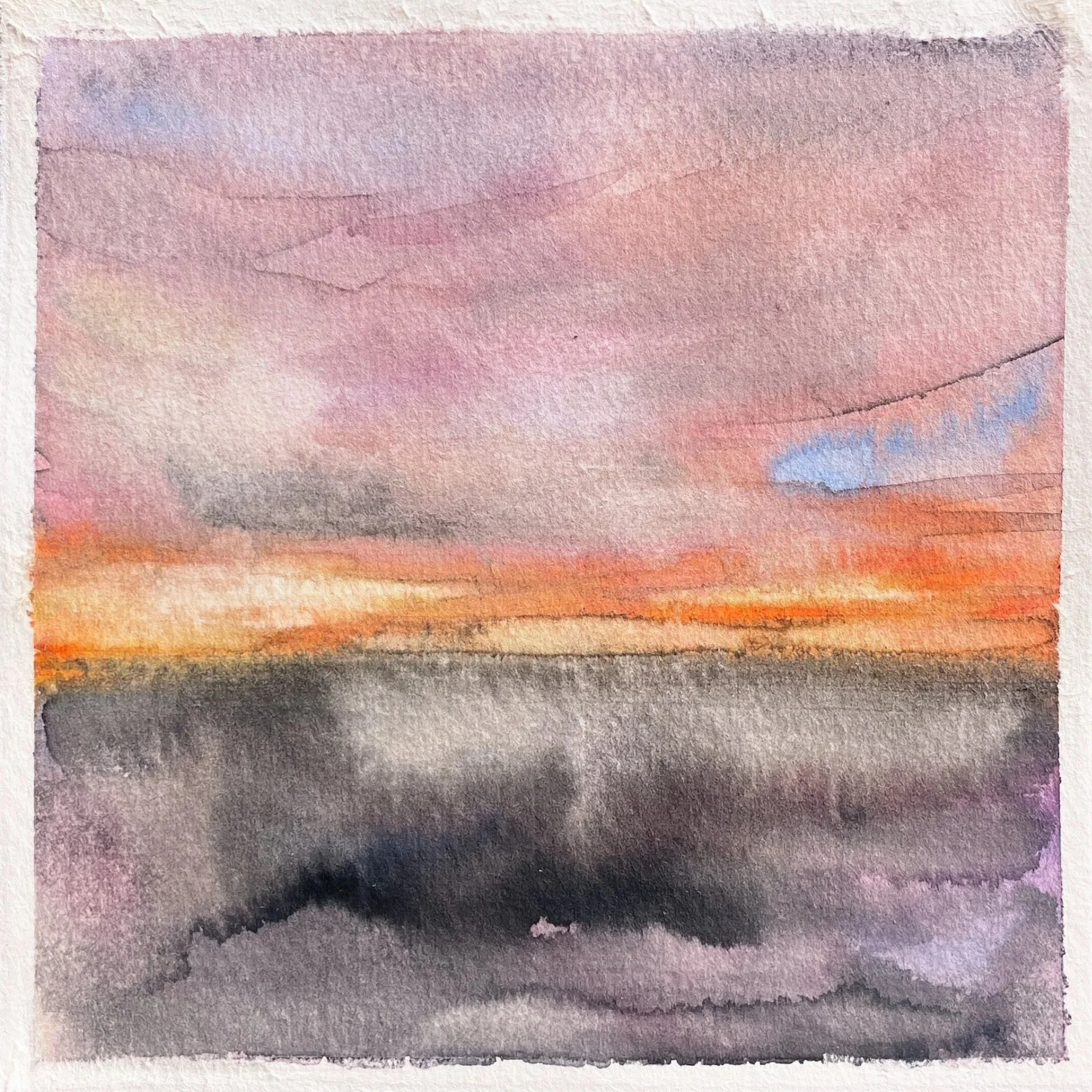 Watercolor painting of a sunset over a body of water with pink, purple, orange, and gray clouds.