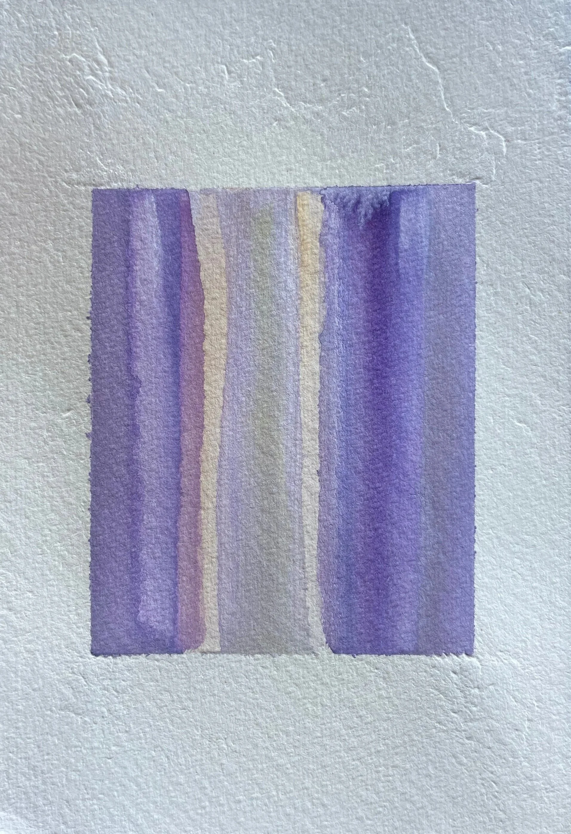 Watercolor painting of vertical stripes in shades of purple, yellow, and gray on textured paper.