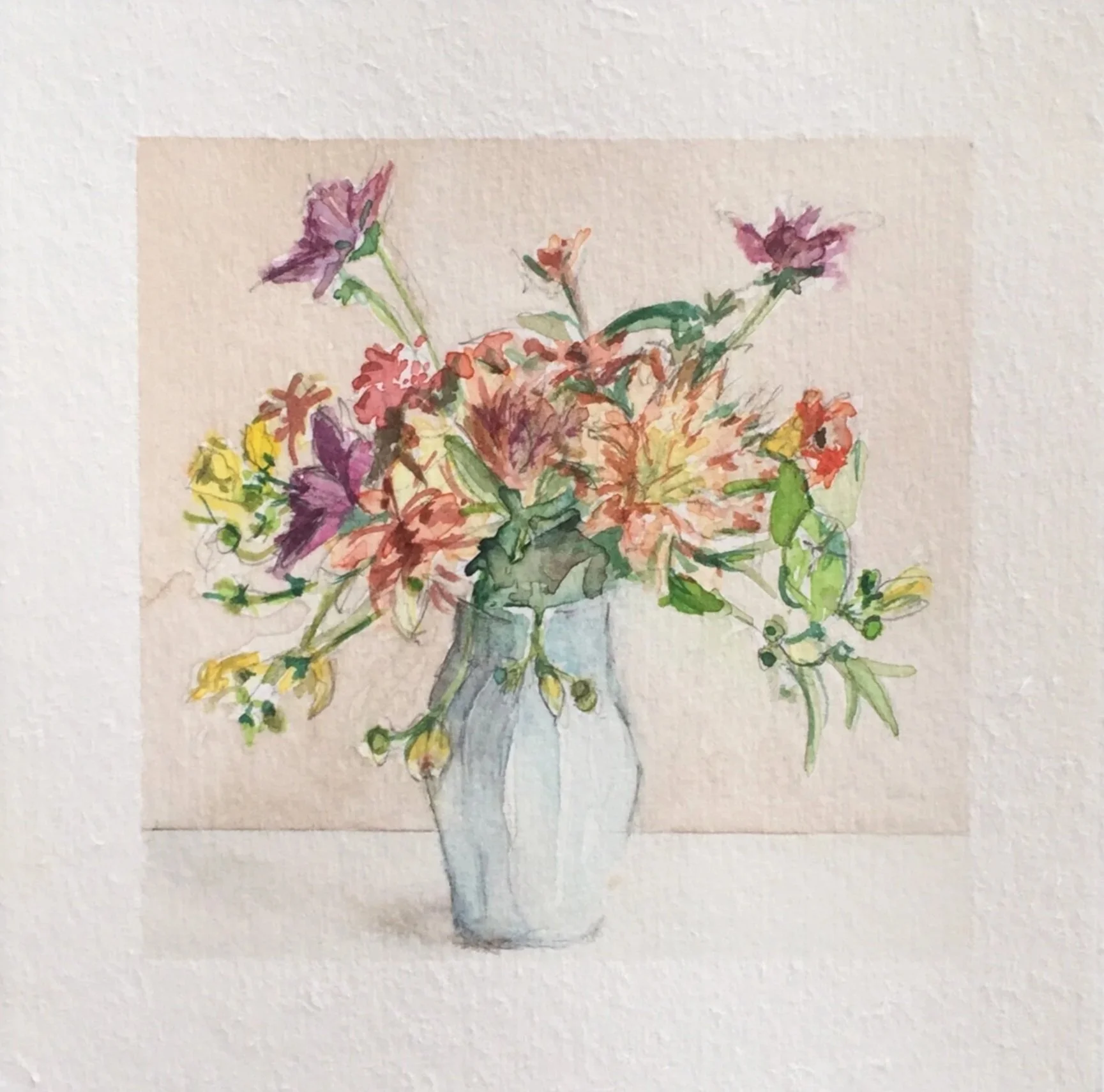 Watercolor painting of a vase with colorful flowers on a wooden surface.