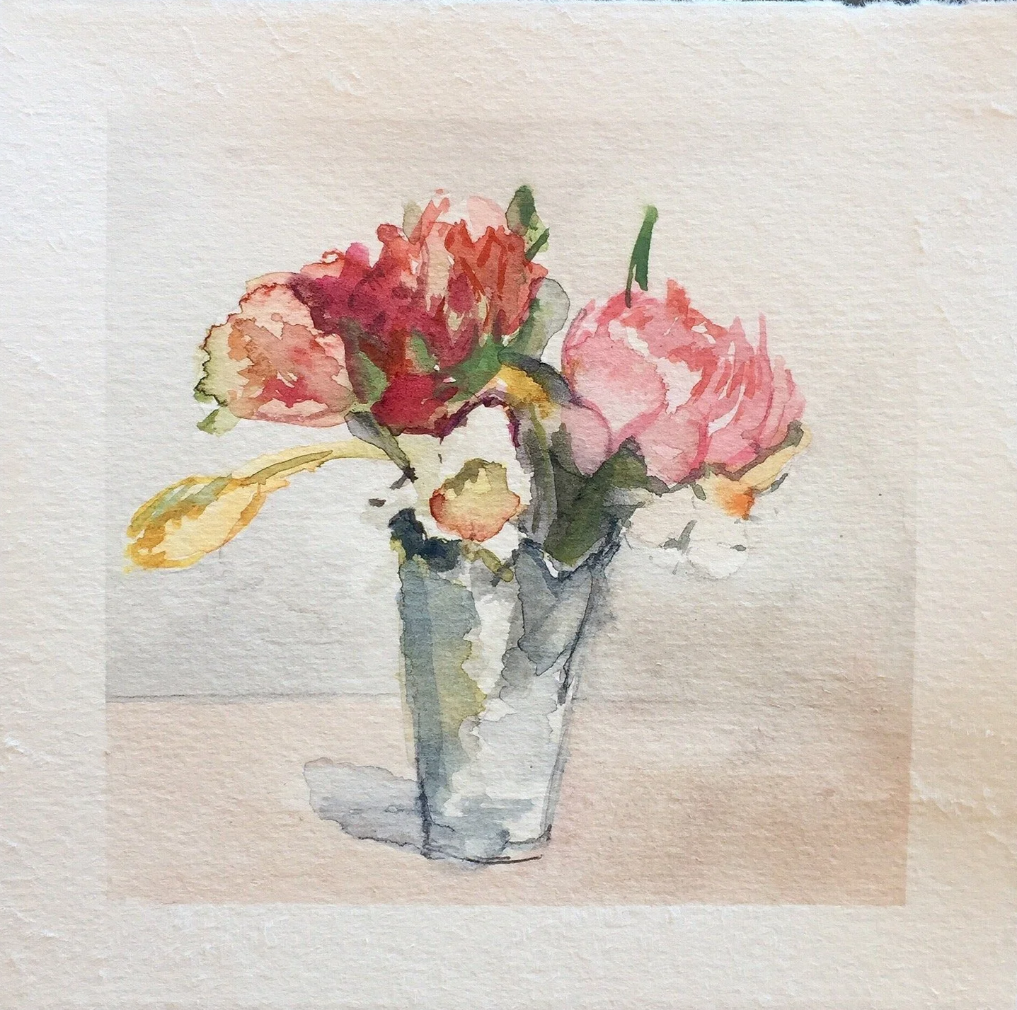 Watercolor painting of a glass vase with pink and red flowers and green leaves.