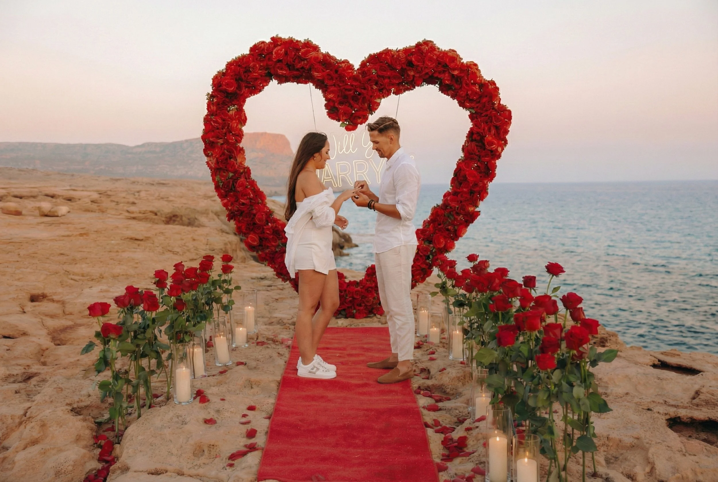 cyprus proposal with red heart arch