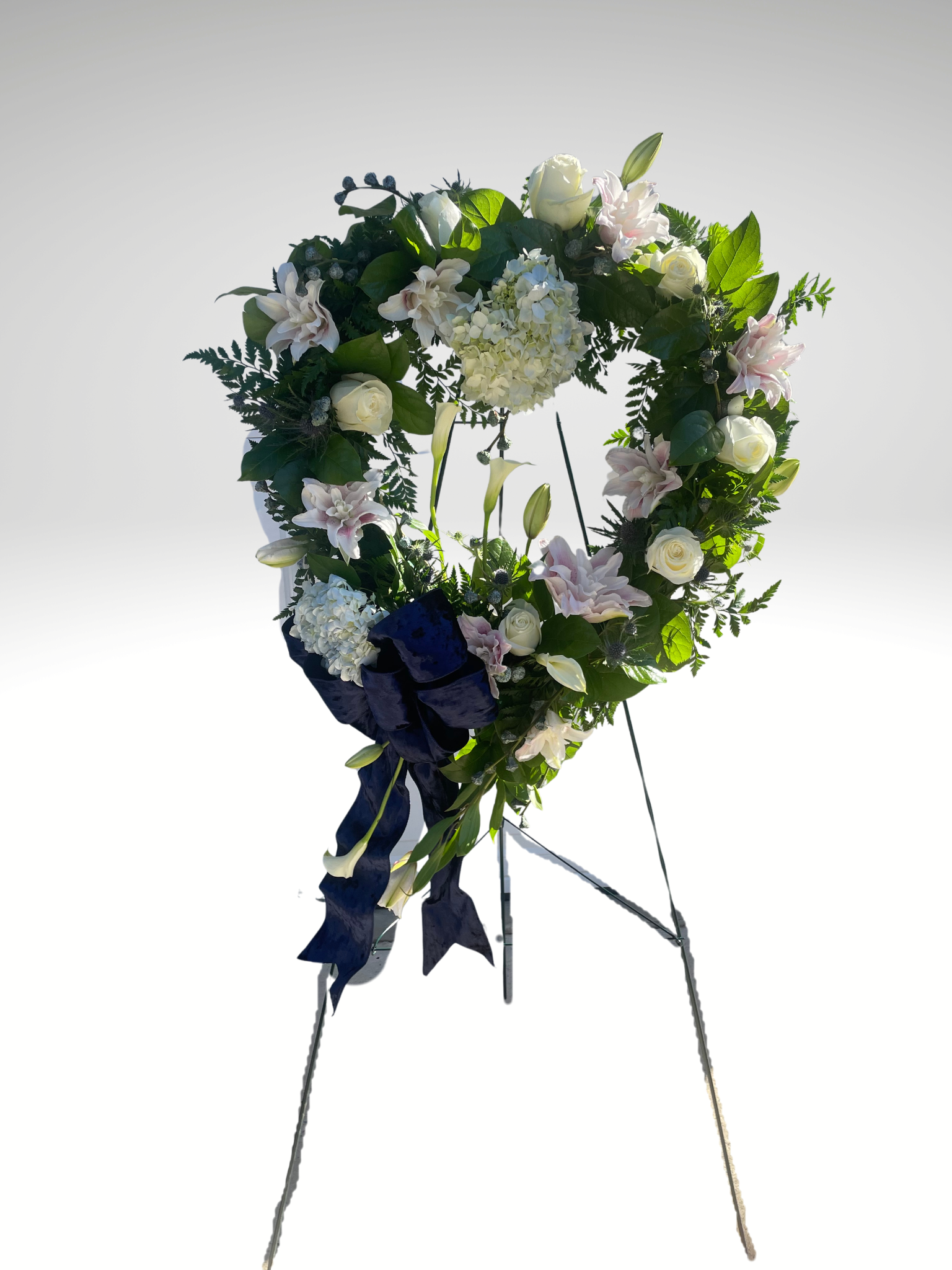 Elegant Heart shaped standing spray (beginning at)