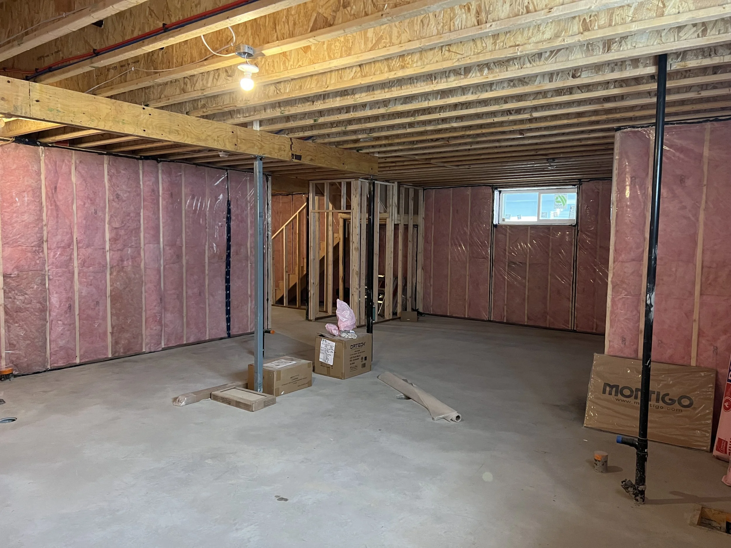 Mechanical room framing with HVAC rough-in and utility connections — LSR Contracting basement development