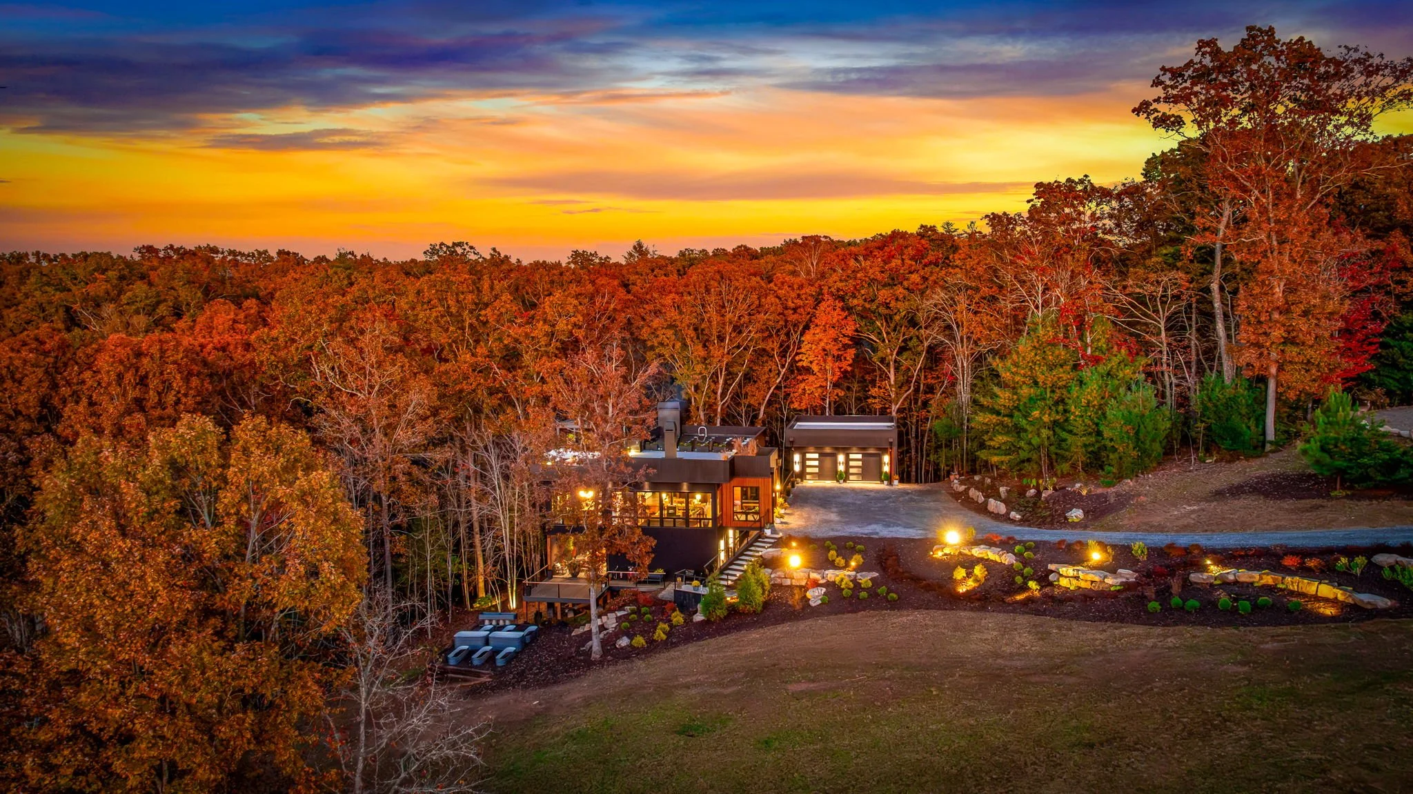 Modern home built in the North Georgia Mountains with landscape and porch