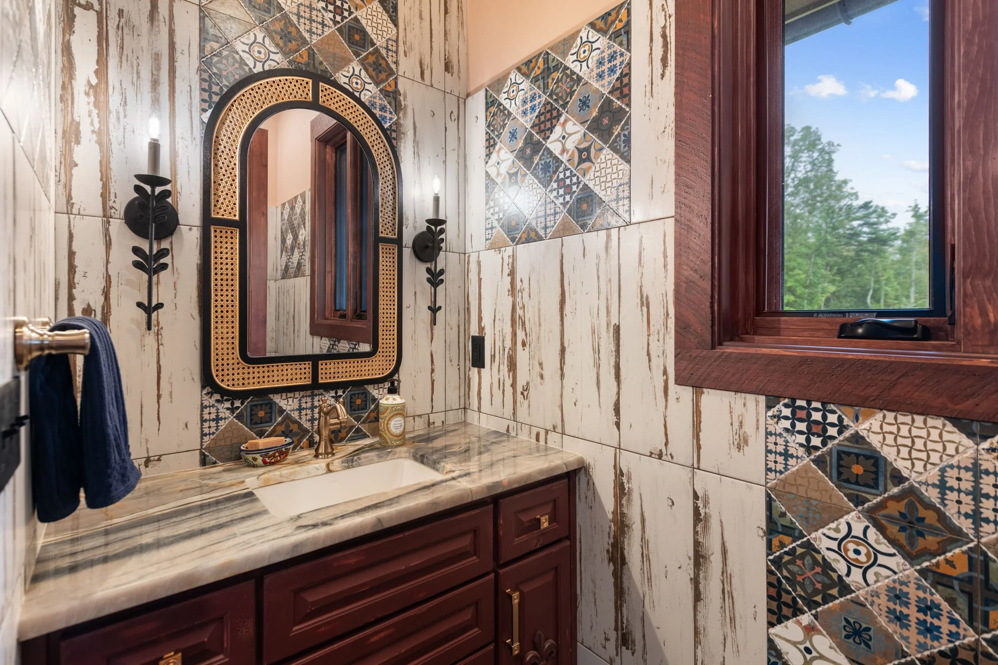 Bathroom with ornate tile work 