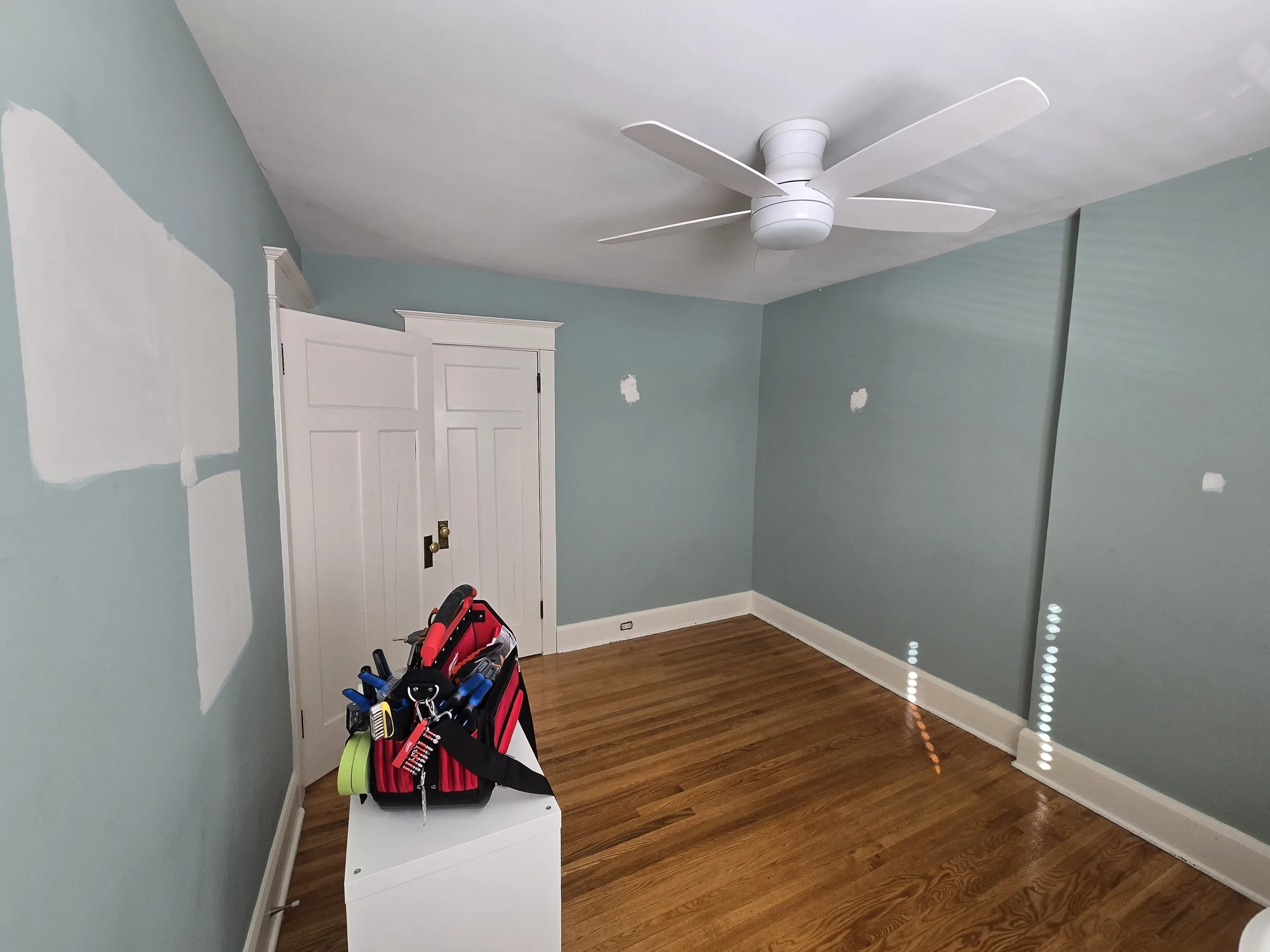 Mimico Bedroom - Before.  Walls in need of repair including sagging plaster