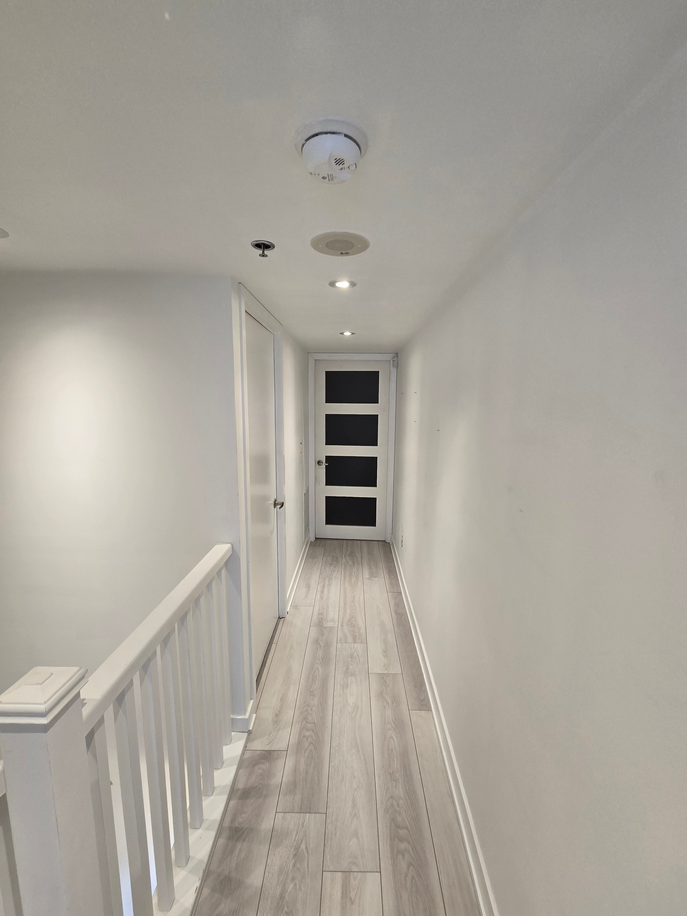 Mimico Townhouse Pre Work - Light space with white walls & trim