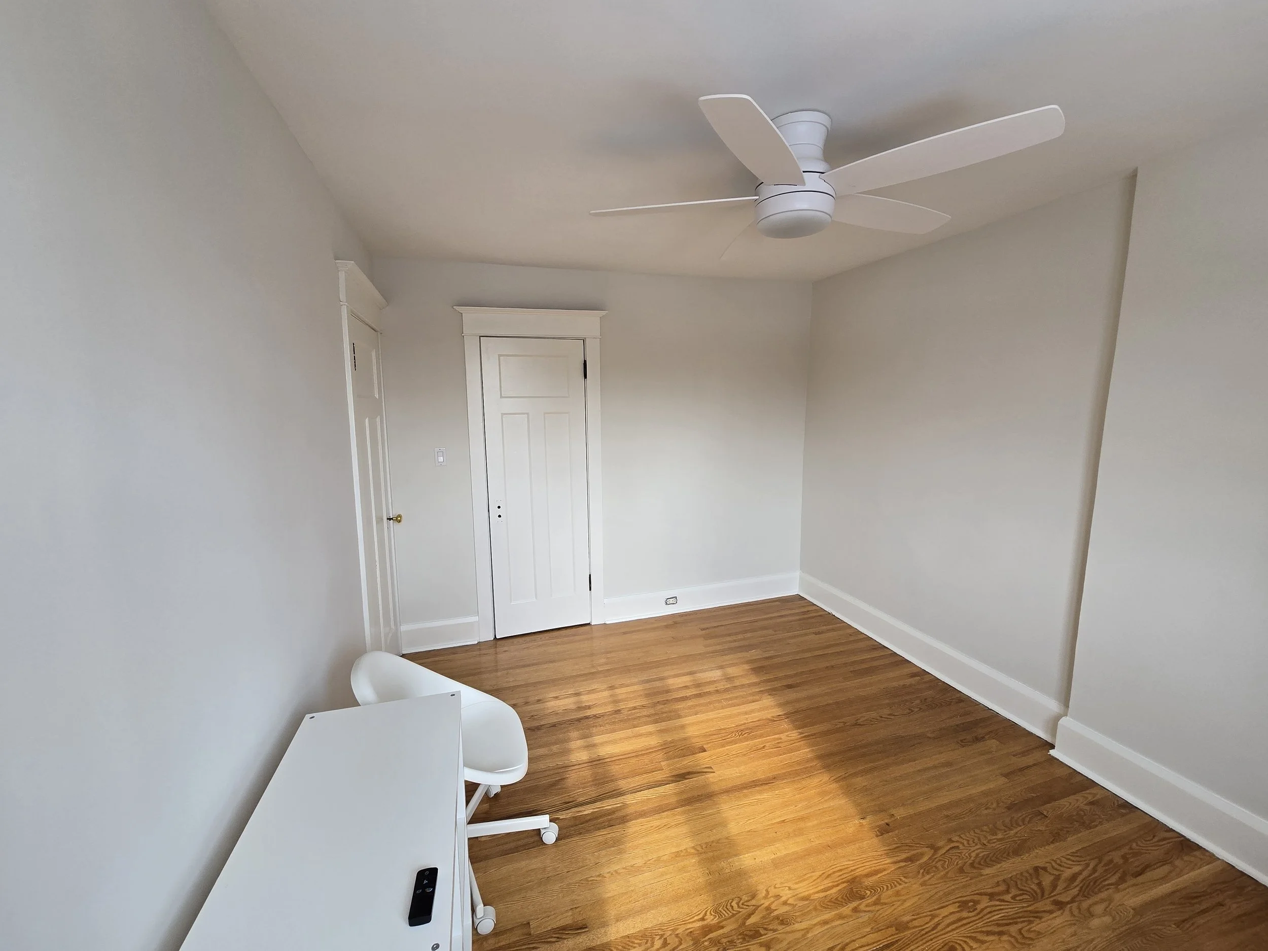 Mimico Bedroom - After.  Walls looking  much fresher.  Sagging plaster repaired.