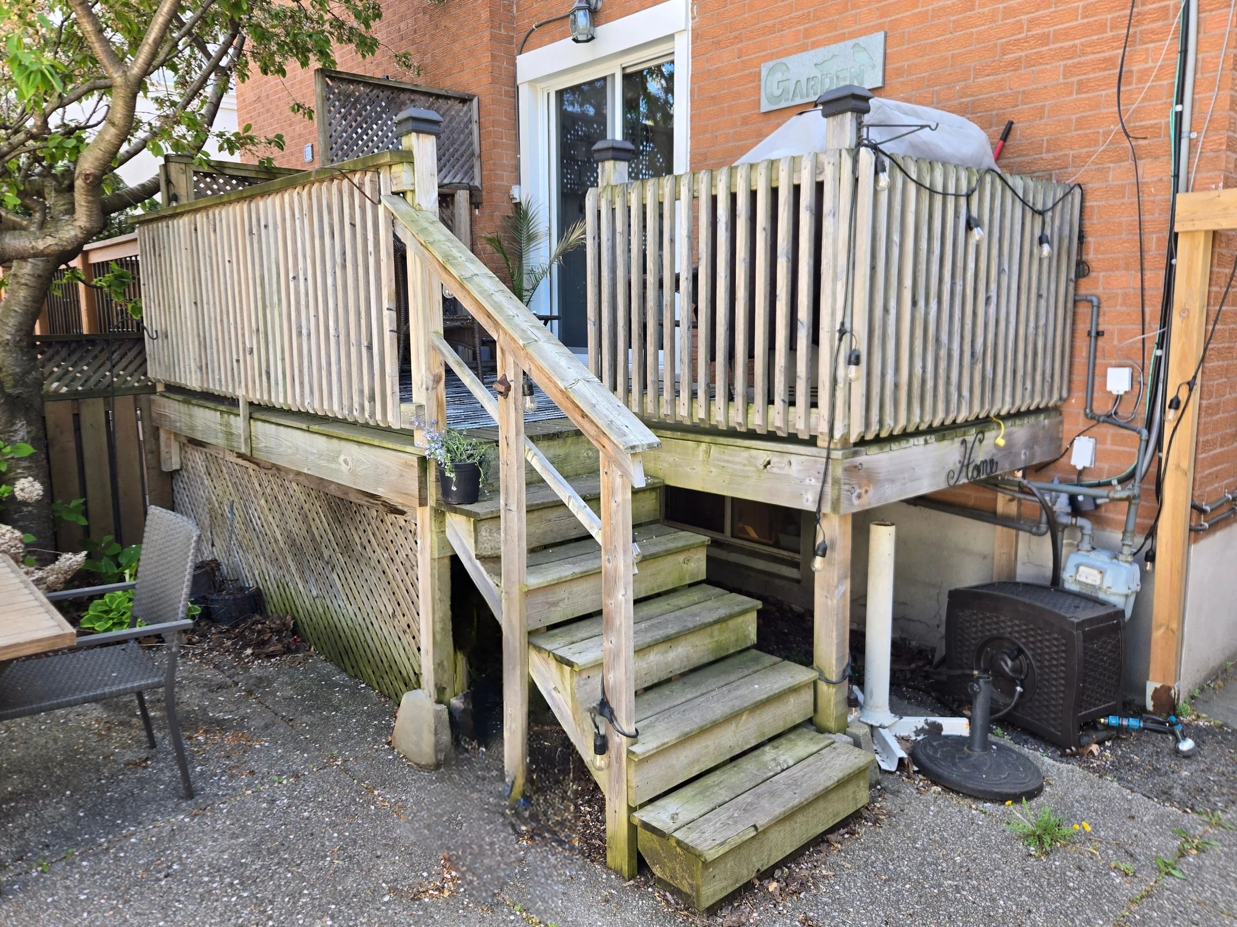 Wood deck - before.   Looking weathered.