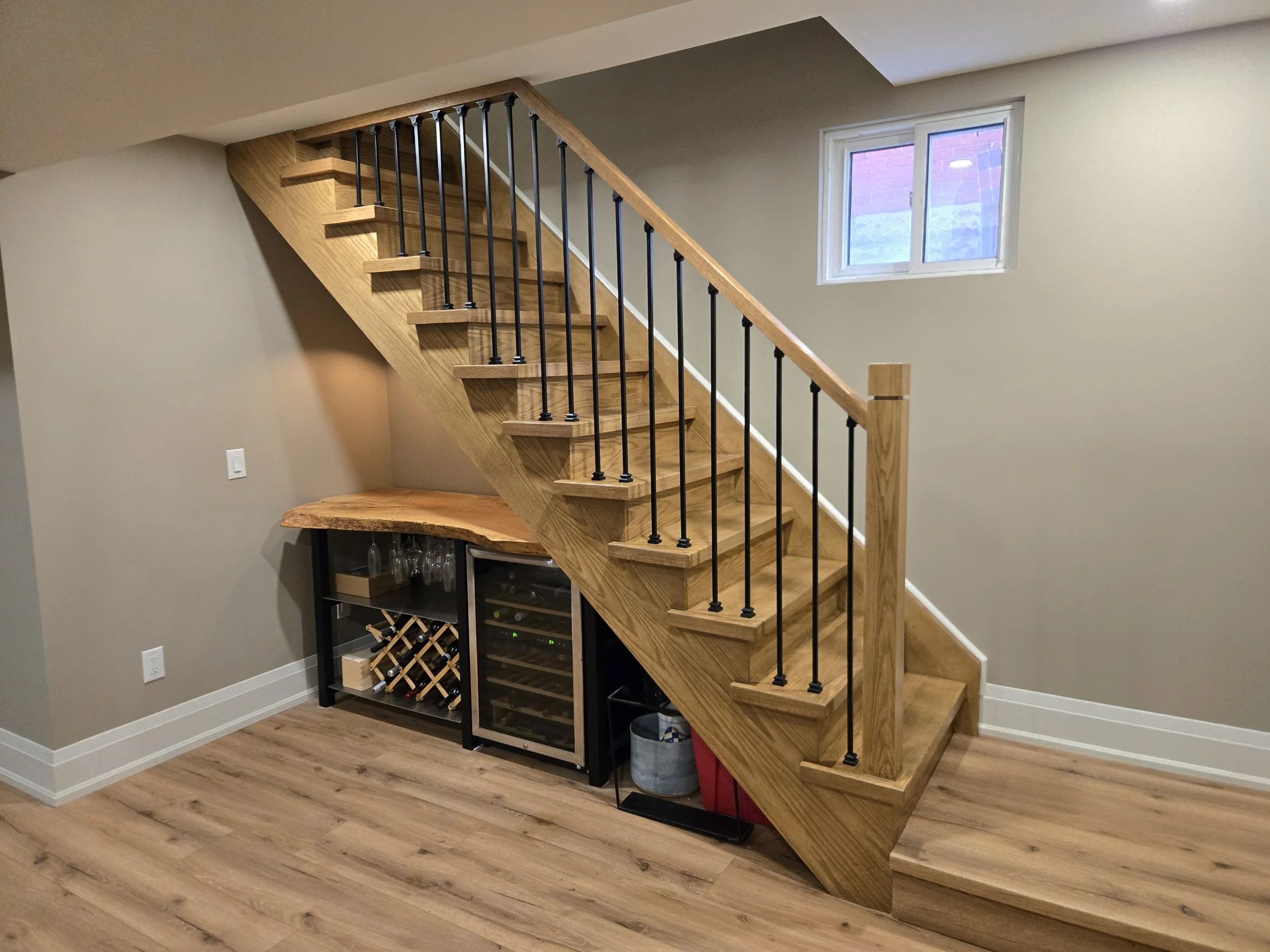 New basement steps after: Custom stain and topcoat added for grain depth and definition.
