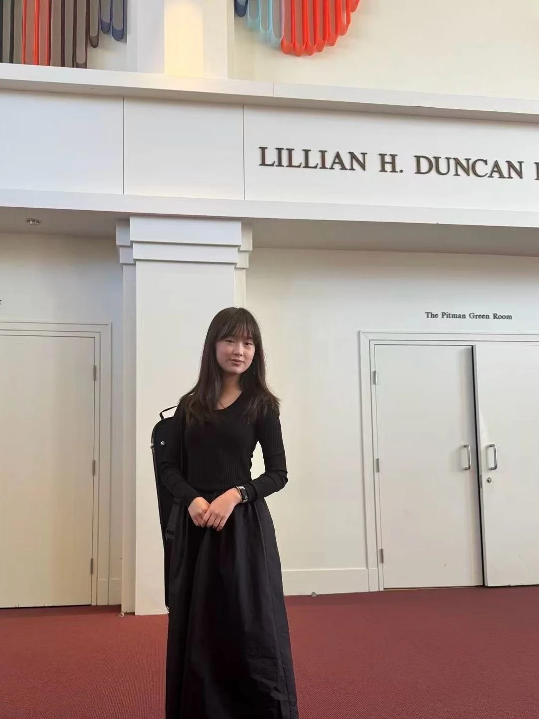 Yuxuan Li professional Photo wearing a black ball style gown