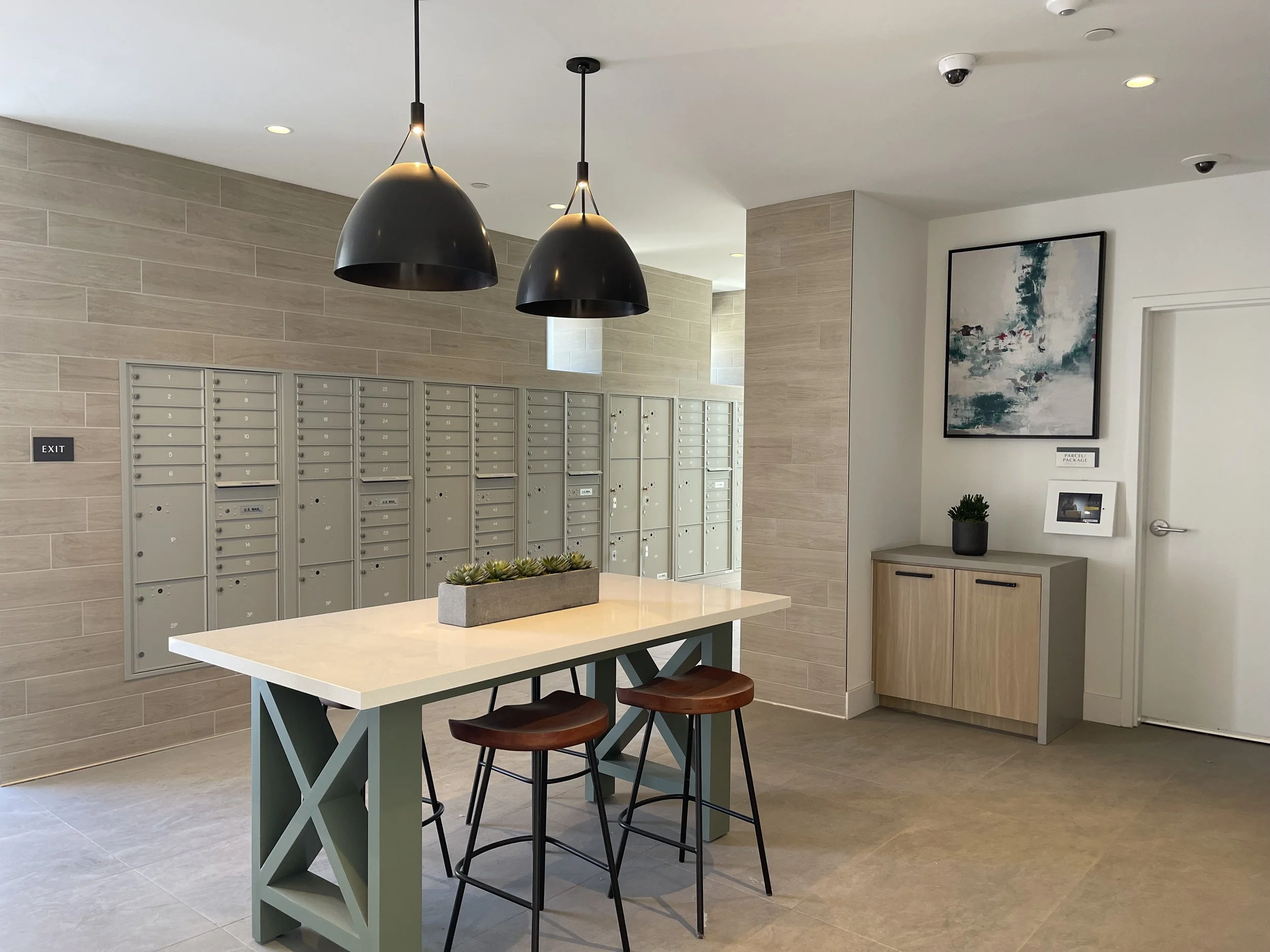 PAC STUDIO_ Multifamily Interior Design_Artisan_Mailroom_Clubhouse Interiors